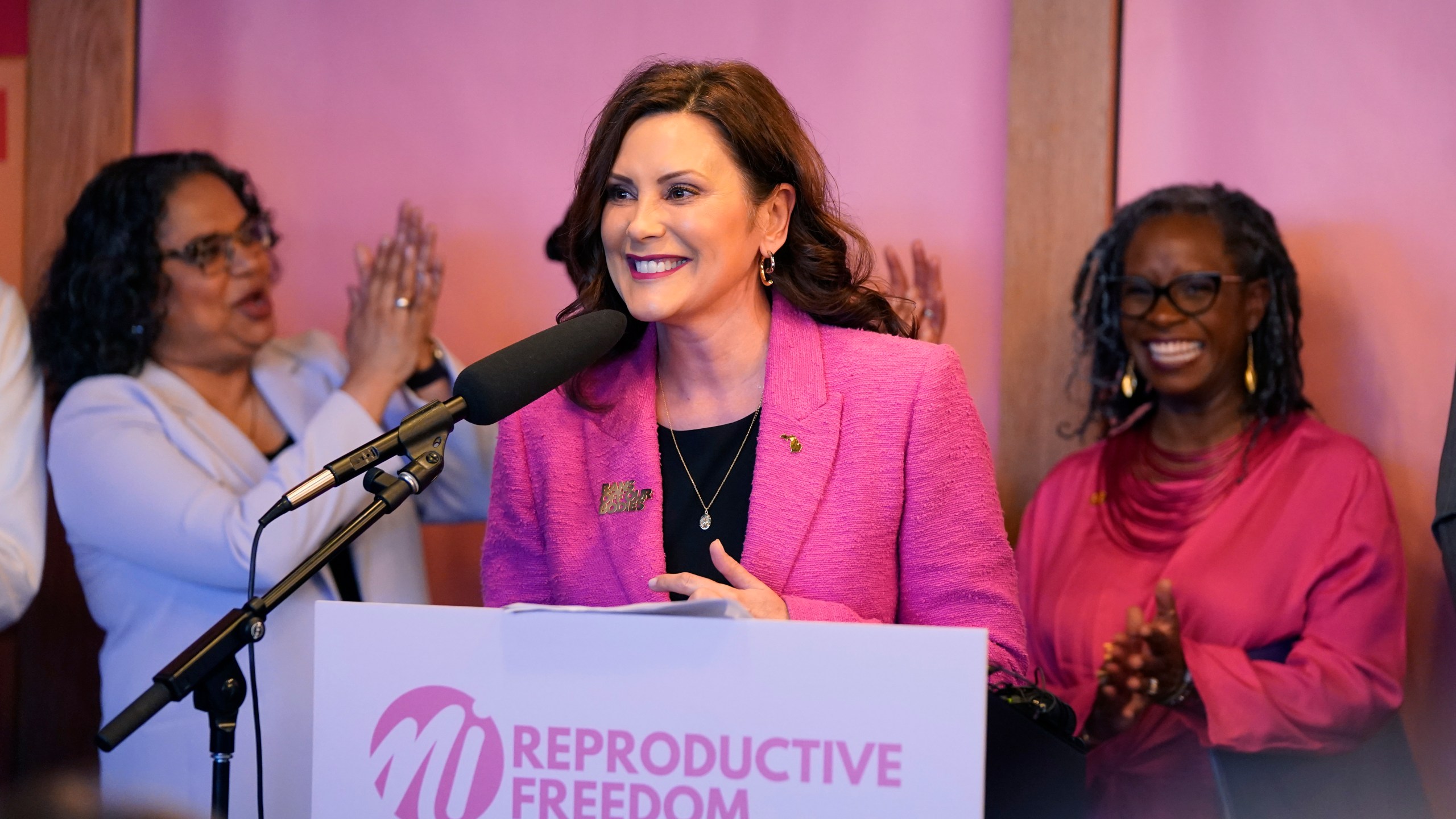 Michigan Gov. Gretchen Whitmer addresses supporters before signing legislation to repeal the 1931 abortion ban statute, which criminalized abortion in nearly all cases during a bill signing ceremony, Wednesday, April 5, 2023, in Birmingham, Mich. The abortion ban, which fueled one of the largest ballot drives in state history, had been unenforceable after voters enshrined abortion rights in the state constitution last November. (AP Photo/Carlos Osorio)