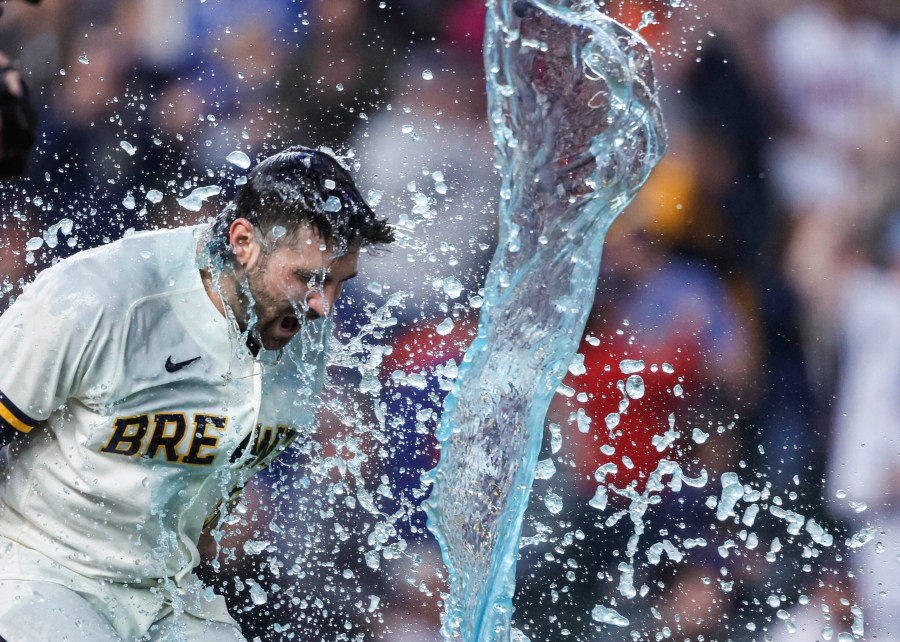 Milwaukee Brewers' Garrett Mitchell (5) reacts after his game-winning home run during the ninth inning of a baseball game against the New York Mets Wednesday, April 5, 2023, in Milwaukee. The Brewers won 7-6. (AP Photo/Jeffrey Phelps)