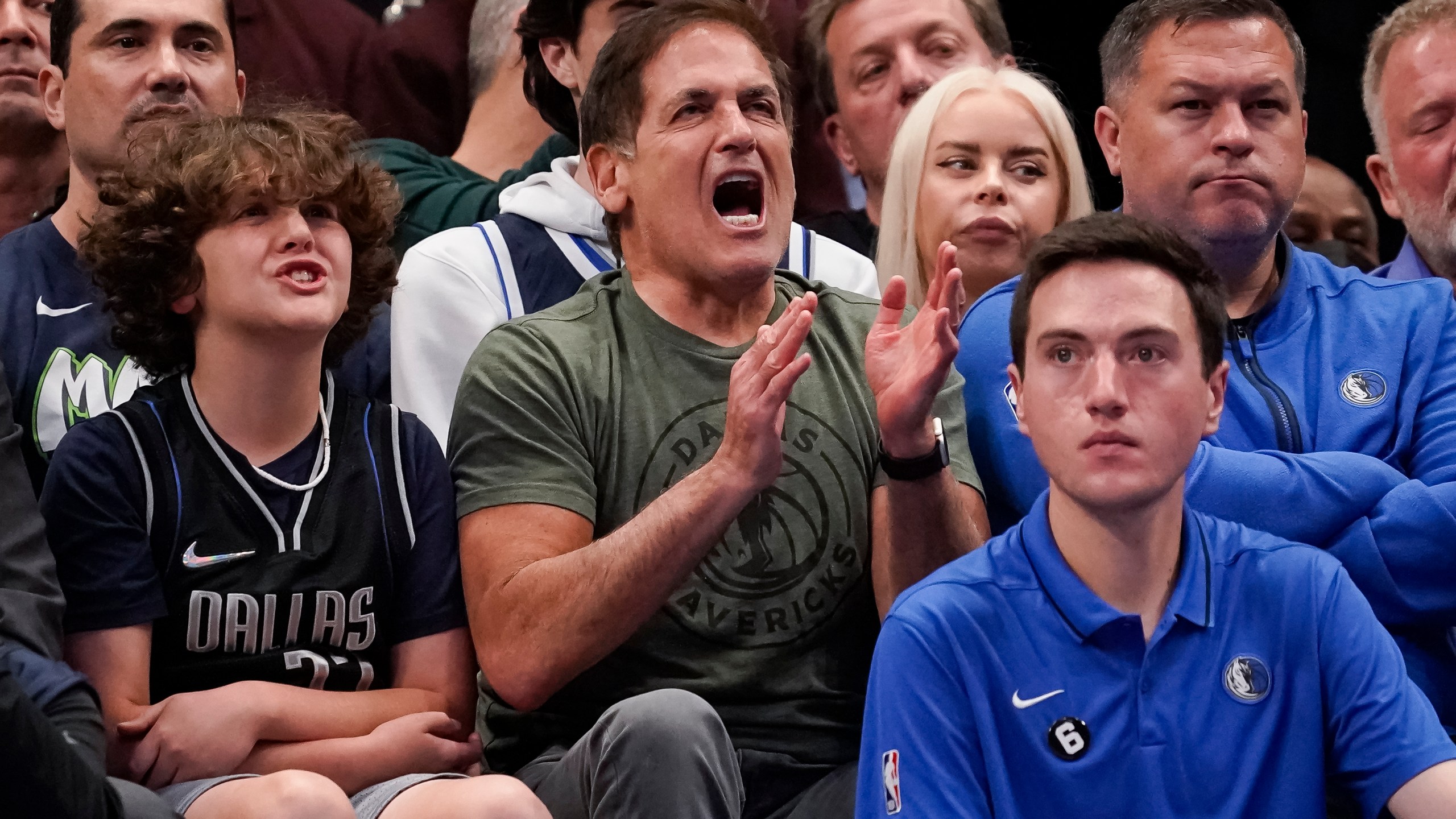 Dallas Mavericks owner Mark Cuban cheers during the first half of the tema's NBA basketball game against the Sacramento Kings in Dallas, Wednesday, April 5, 2023. (AP Photo/Sam Hodde)