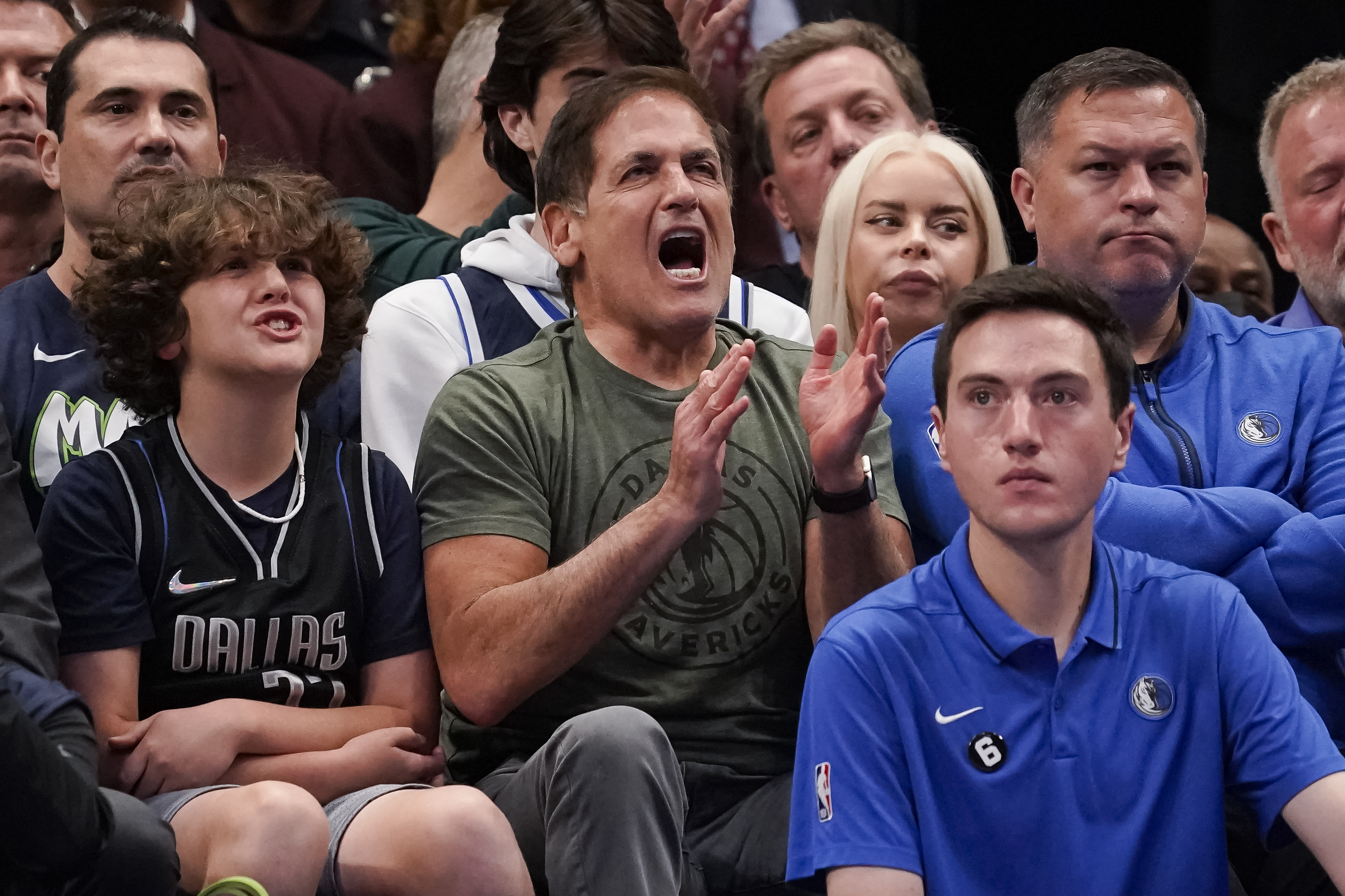 Dallas Mavericks owner Mark Cuban cheers during the first half of the tema's NBA basketball game against the Sacramento Kings in Dallas, Wednesday, April 5, 2023. (AP Photo/Sam Hodde)