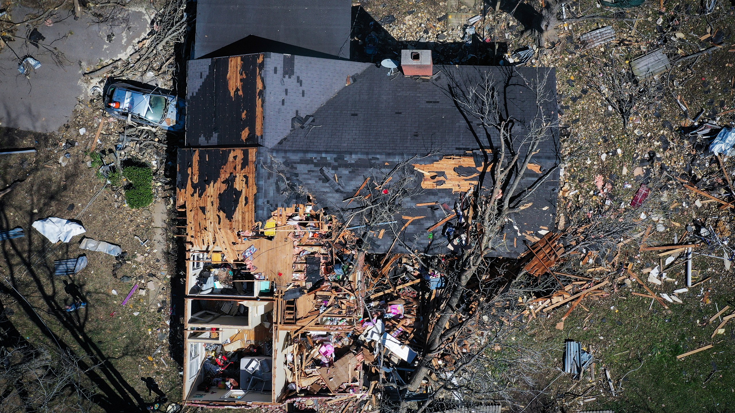 A house is destroyed from a tornado in Covington, Tenn., Saturday, April 1, 2023. Storms that spawned possibly dozens of tornadoes have killed several people in the South and Midwest. (Patrick Lantrip/Daily Memphian via AP)