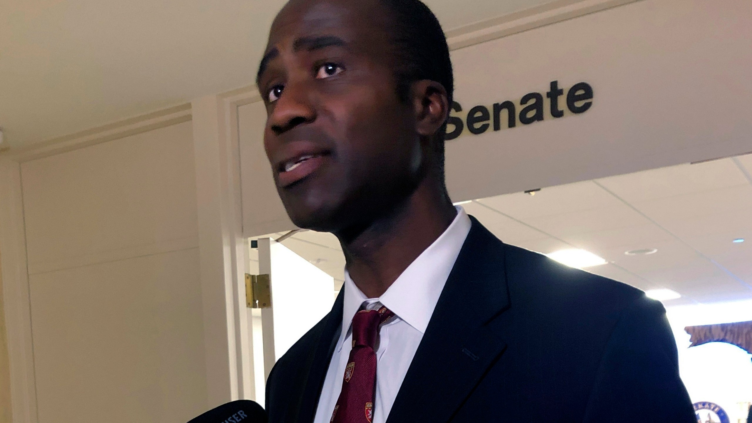 FILE - Dr. Joseph Ladapo speaks with reporters after the Florida Senate confirmed his appointment as the state's surgeon general on Feb. 23, 2022, in Tallahassee, Fla. An analysis that was the basis of a highly criticized recommendation from Florida’s surgeon general cautioning young men against getting the COVID-19 vaccine omitted information that showed catching the virus could increase the risk of a cardiac-related death much more than getting the shot. That's according to drafts of the analysis obtained by the Tampa Bay Times. (AP Photo/Brendan Farrington, File)