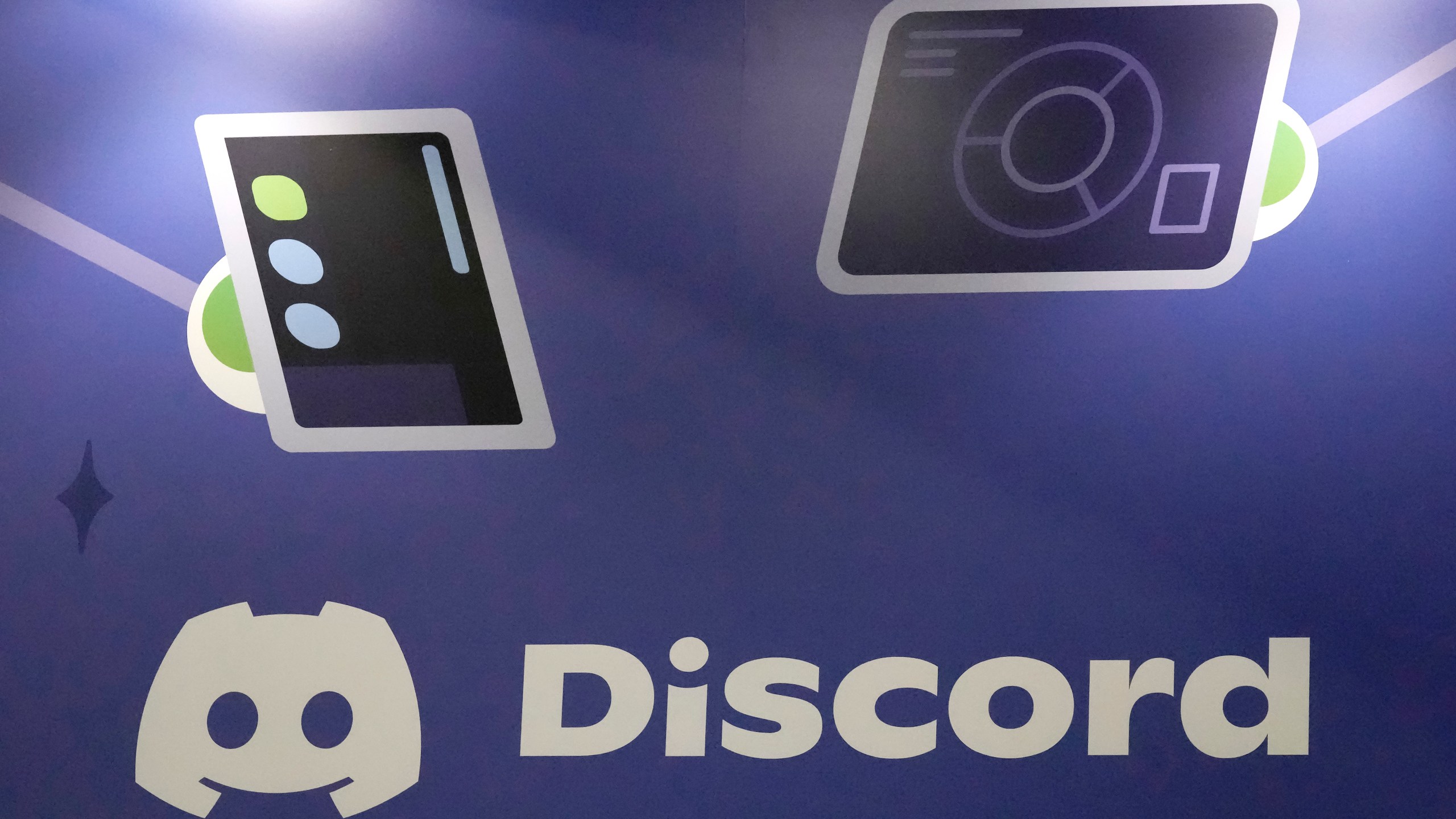 FILE - A display Discord stands at the company's booth at the Game Developers Conference 2023 in San Francisco on March 22, 2023. A major leak of classified U.S. documents that’s shaken Washington and exposed new details of its intelligence gathering may have started in a chatroom on the social media platform popular with gamers. (AP Photo/Jeff Chiu, File)