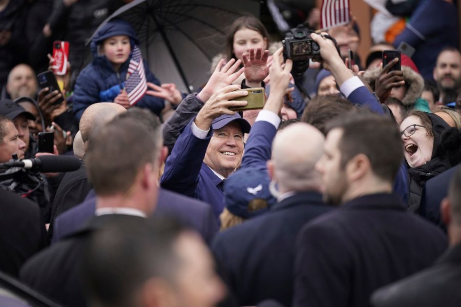 President Joe Biden takes a selfie while on a walkabout through Dundalk, County Louth, during his trip Ireland, Wednesday April 12, 2023. (Niall Carson/PA via AP)