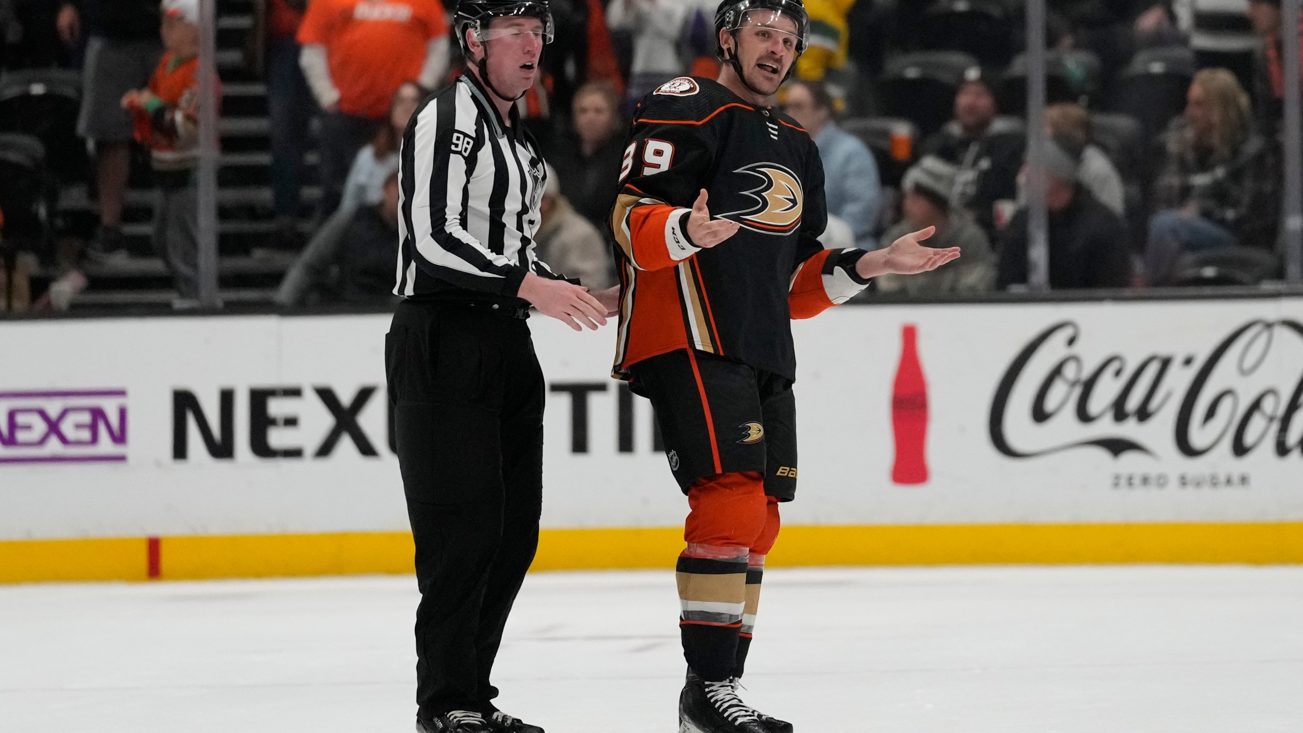 Anaheim Ducks center Sam Carrick (39) is ejected during the third period of an NHL hockey game against the Los Angeles Kings in Anaheim, Calif., Thursday, April 13, 2023. (AP Photo/Ashley Landis)