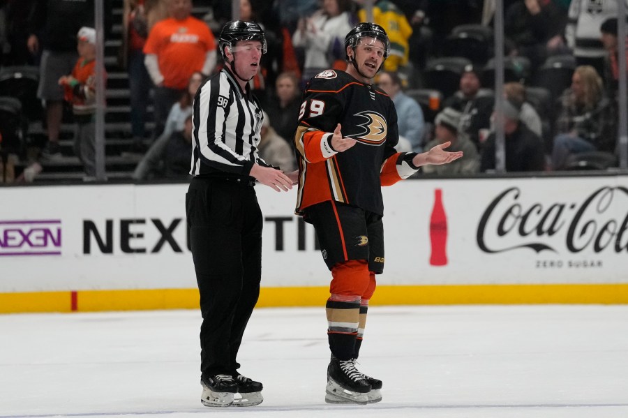 Anaheim Ducks center Sam Carrick (39) is ejected during the third period of an NHL hockey game against the Los Angeles Kings in Anaheim, Calif., Thursday, April 13, 2023. (AP Photo/Ashley Landis)