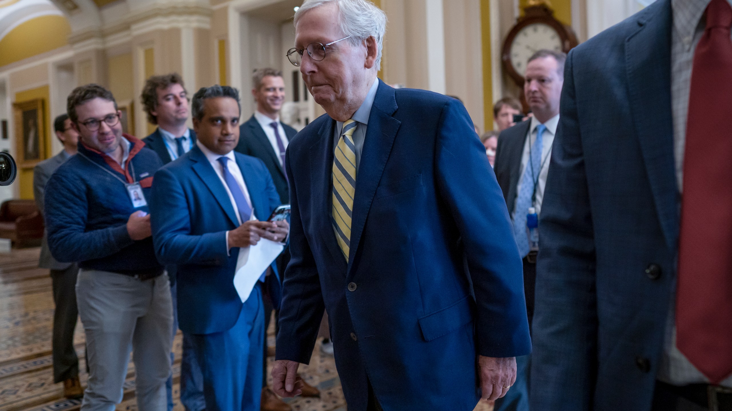 Senate Minority Leader Mitch McConnell, R-Ky., returns to the chamber almost six weeks after a fall that left him with a rib fracture and concussion, at the Capitol in Washington, Monday, April 17, 2023. The longtime Kentucky senator, 81, has been recovering at home since he was released from a rehabilitation facility on March 25. (AP Photo/J. Scott Applewhite)