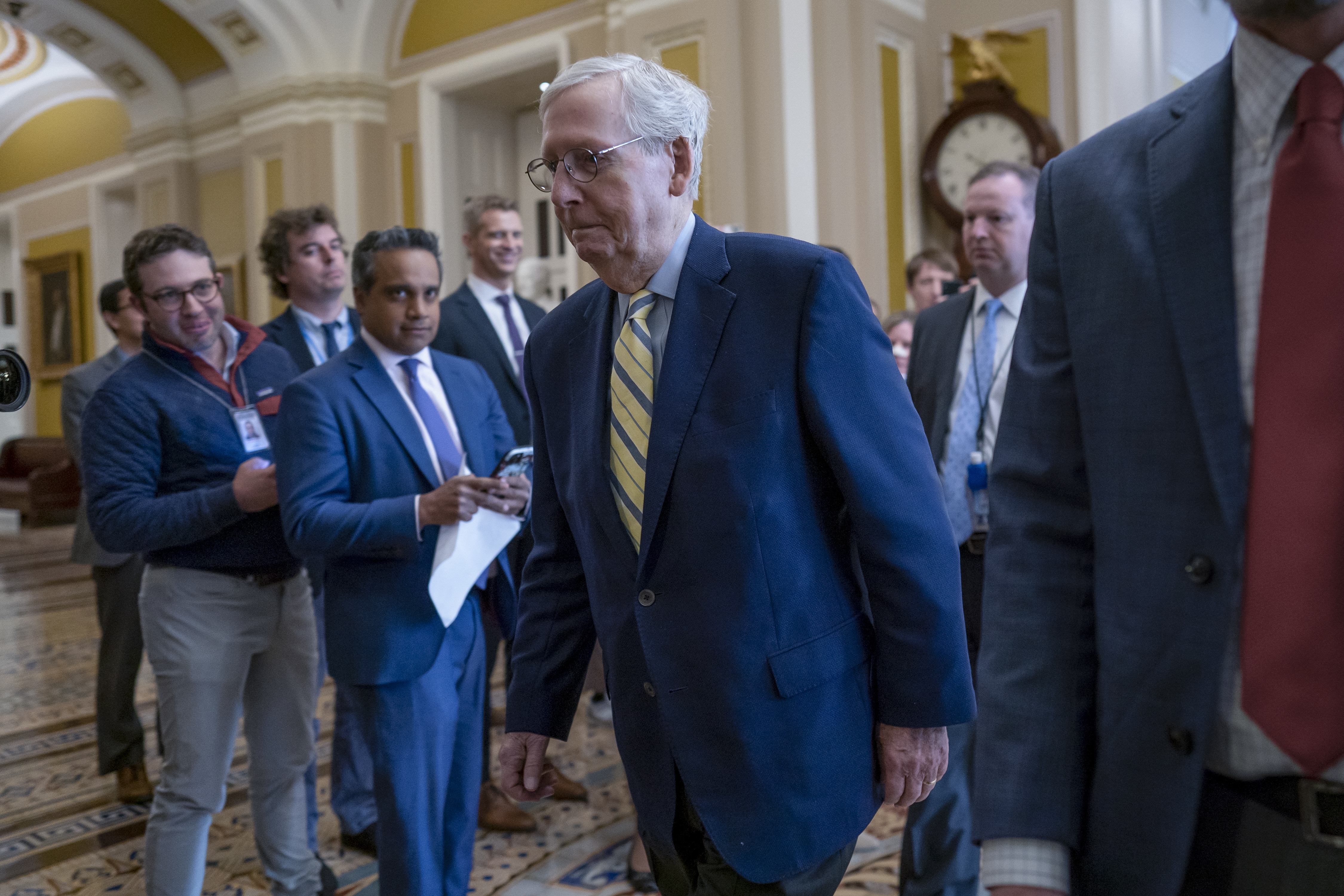 Senate Minority Leader Mitch McConnell, R-Ky., returns to the chamber almost six weeks after a fall that left him with a rib fracture and concussion, at the Capitol in Washington, Monday, April 17, 2023. The longtime Kentucky senator, 81, has been recovering at home since he was released from a rehabilitation facility on March 25. (AP Photo/J. Scott Applewhite)