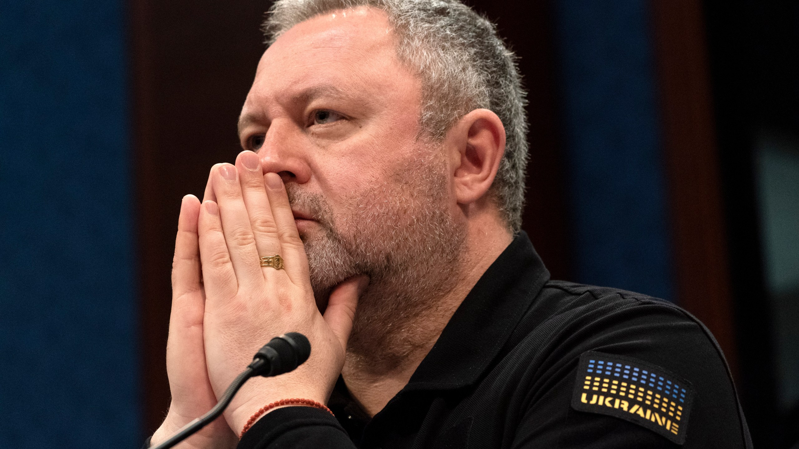 Ukrainian Prosecutor General Andriy Kostin listens before testifying at a House Foreign Affairs Committee hearing on war crimes committed by Russia in Ukraine, Wednesday, April 19, 2023, on Capitol Hill in Washington. (AP Photo/Jacquelyn Martin)