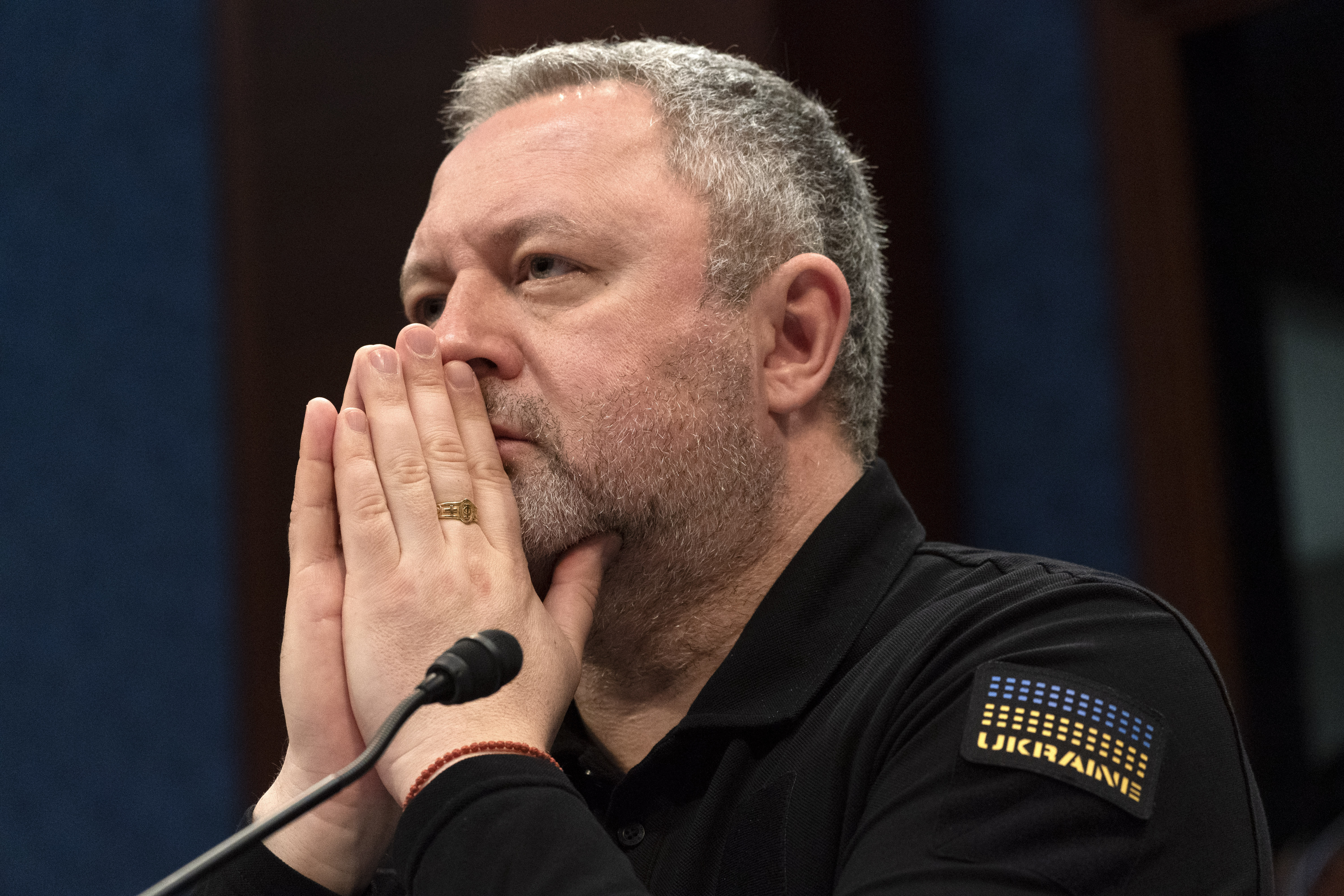 Ukrainian Prosecutor General Andriy Kostin listens before testifying at a House Foreign Affairs Committee hearing on war crimes committed by Russia in Ukraine, Wednesday, April 19, 2023, on Capitol Hill in Washington. (AP Photo/Jacquelyn Martin)