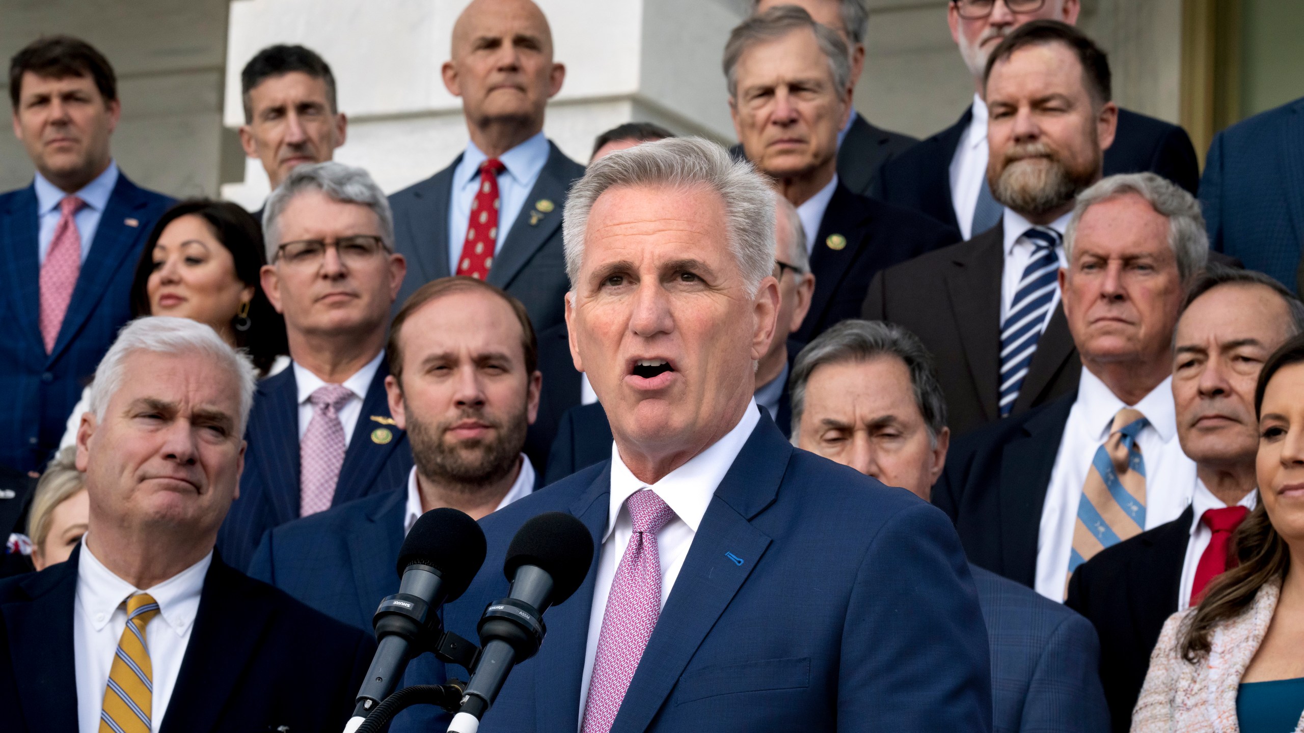 Speaker of the House Kevin McCarthy, R-Calif., holds an event to mark 100 days of the Republican majority in the House, at the Capitol in Washington, Monday, April 17, 2023. In a speech Monday at the New York Stock Exchange, the Republican leader accused President Joe Biden of refusing to engage in budget-cutting negotiations to prevent a debt crisis. (AP Photo/J. Scott Applewhite)