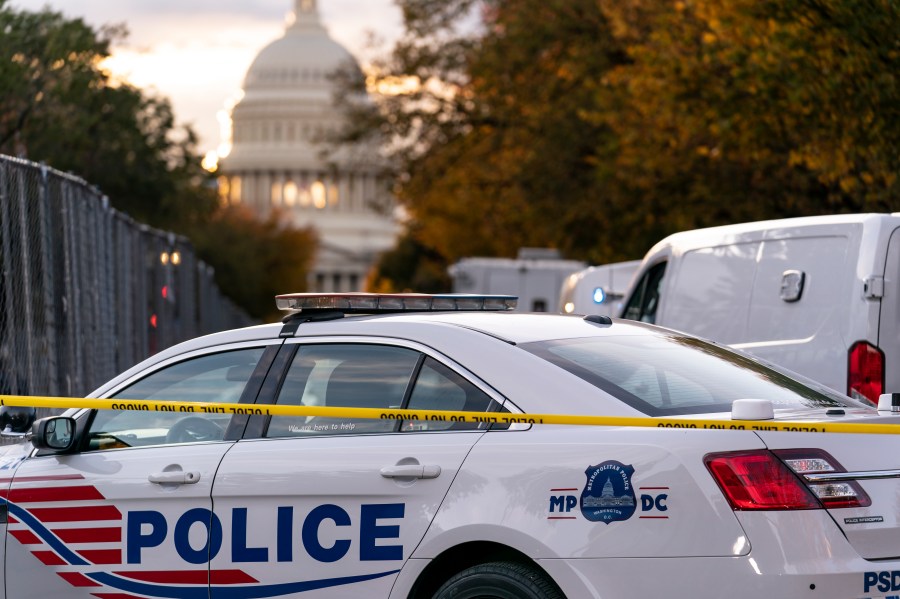 FILE - Washington Metropolitan Police investigate near the Supreme Court and U.S. Capitol in Washington, Oct. 19, 2022. The Republican-led House is set to approve a resolution Wednesday, April 19, 2023, that would block a District of Columbia police accountability bill, further escalating the feud over the right to self-government in the nation’s capital. (AP Photo/J. Scott Applewhite, File)