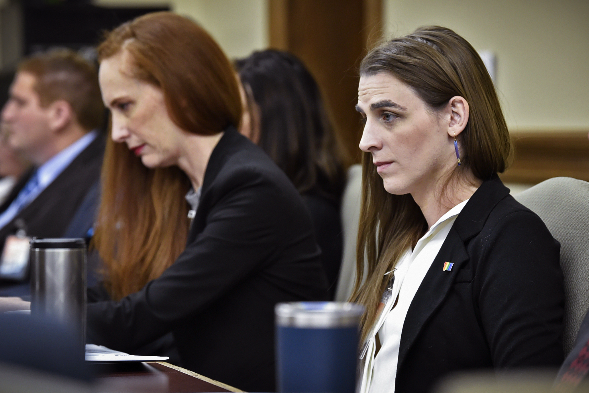 FILE - Zooey Zephyr, right, attends a legislative training session at the state Capitol in Helena, Mont., on Nov. 16, 2022. Zephyr, who is one of the first two transgender candidates elected to the Montana Legislature, was intentionally misgendered on April 18, 2023, in a demand by the Montana Freedom Caucus that the state House censure her for comments she made on the House floor about a bill to ban transgender medical care for children. (Thom Bridge/Independent Record via AP, File)