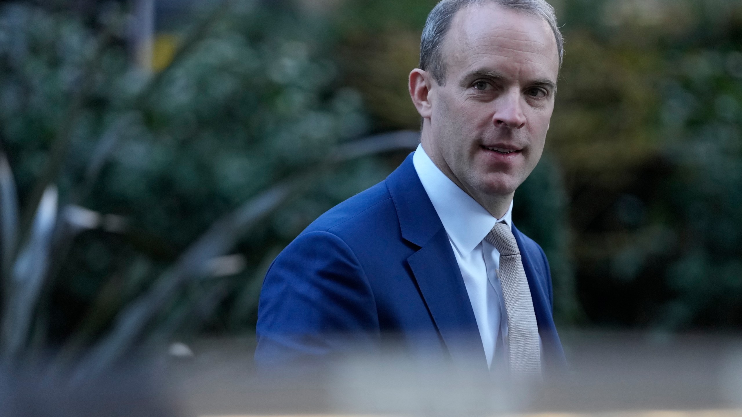 FILE - Britain's Deputy Prime Minister Dominic Raab arrives at 10 Downing Street in London, Tuesday, Jan. 18, 2022. Raab has resigned after an independent investigation into complaints that he bullied civil servants. Raab’s decision Friday, April 21, 2023 came the day after Prime Minister Rishi Sunak received findings into eight formal complaints that Raab, who is also justice secretary, had been abusive toward staff during a previous stint in that office and while serving as foreign secretary and Brexit secretary. (AP Photo/Alastair Grant file)