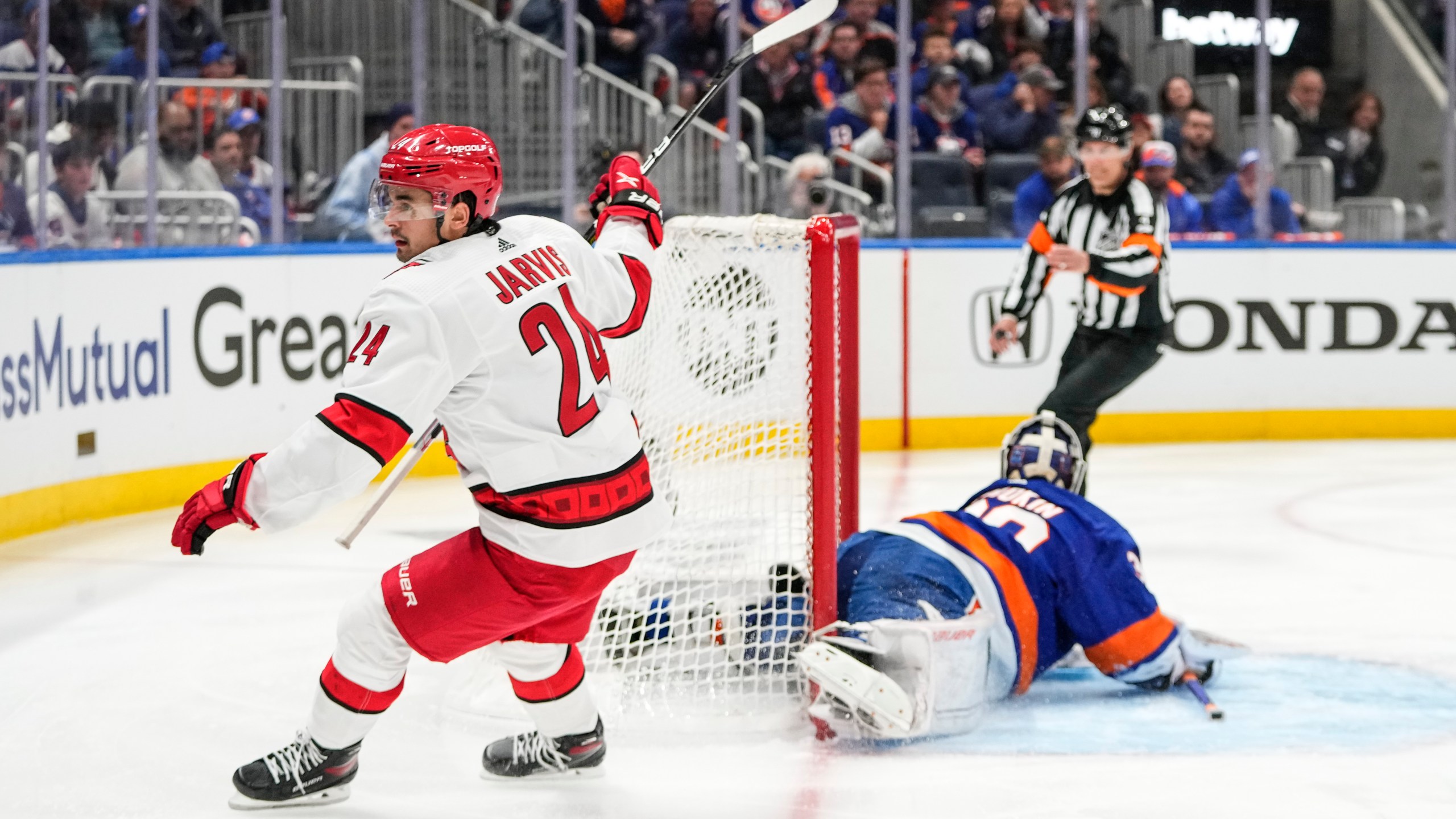 Carolina Hurricanes' Seth Jarvis reacts after scoring a goal during the third period of Game 4 of an NHL hockey Stanley Cup first-round playoff series against the New York Islanders, Sunday, April 23, 2023, in Elmont, N.Y. The Hurricanes won 5-2. (AP Photo/Frank Franklin II)