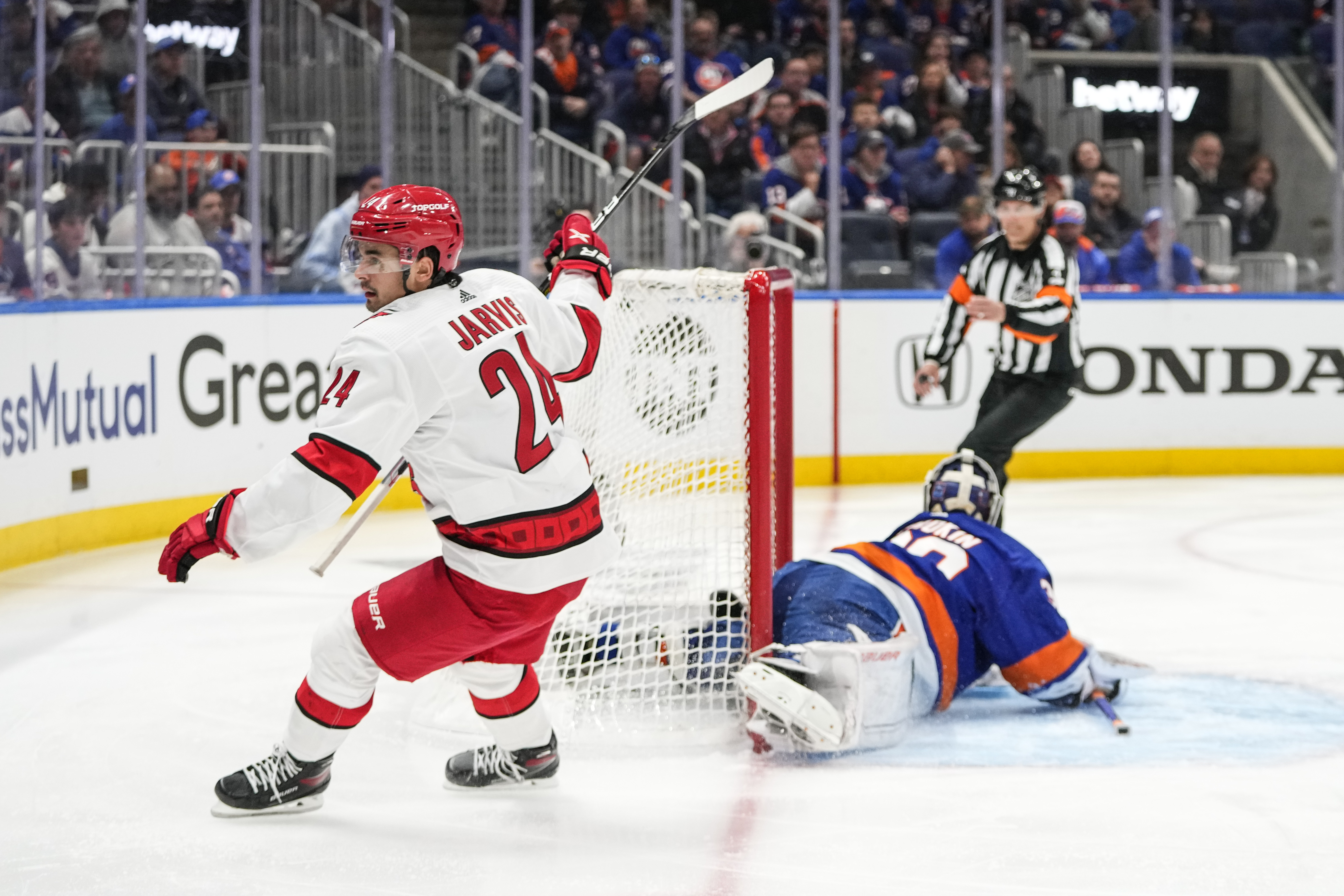 Carolina Hurricanes' Seth Jarvis reacts after scoring a goal during the third period of Game 4 of an NHL hockey Stanley Cup first-round playoff series against the New York Islanders, Sunday, April 23, 2023, in Elmont, N.Y. The Hurricanes won 5-2. (AP Photo/Frank Franklin II)