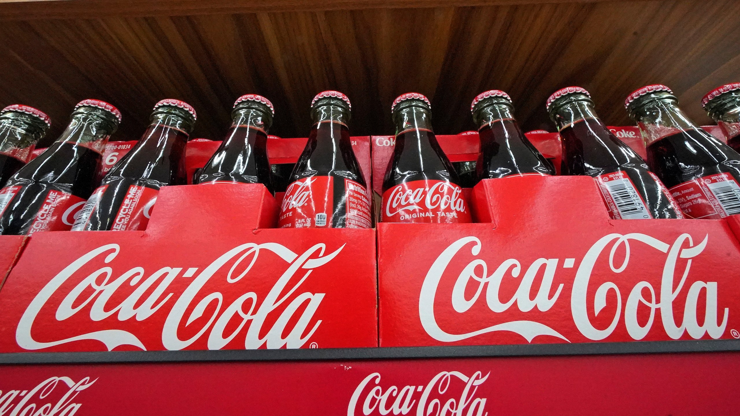 Bottles of Coca-Cola are on display at a grocery market in Uniontown, Pa, on Sunday, April 24, 2022. Coca-Cola reports earnings on Monday, April 24, 2023. (AP Photo/Gene J. Puskar)