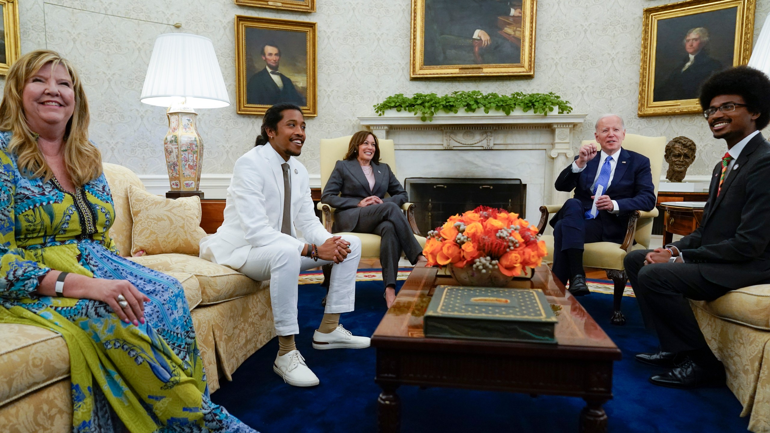 President Joe Biden speaks as he meets with Tennessee state lawmakers State Rep. Gloria Johnson, D-Knoxville, left, State Rep. Justin Jones, D-Nashville, second from left, and State Rep. Justin Pearson, D-Memphis, right, in the Oval Office of the White House, Monday, April 24, 2023, in Washington. Vice President Kamala Harris listens third from left. (AP Photo/Andrew Harnik)