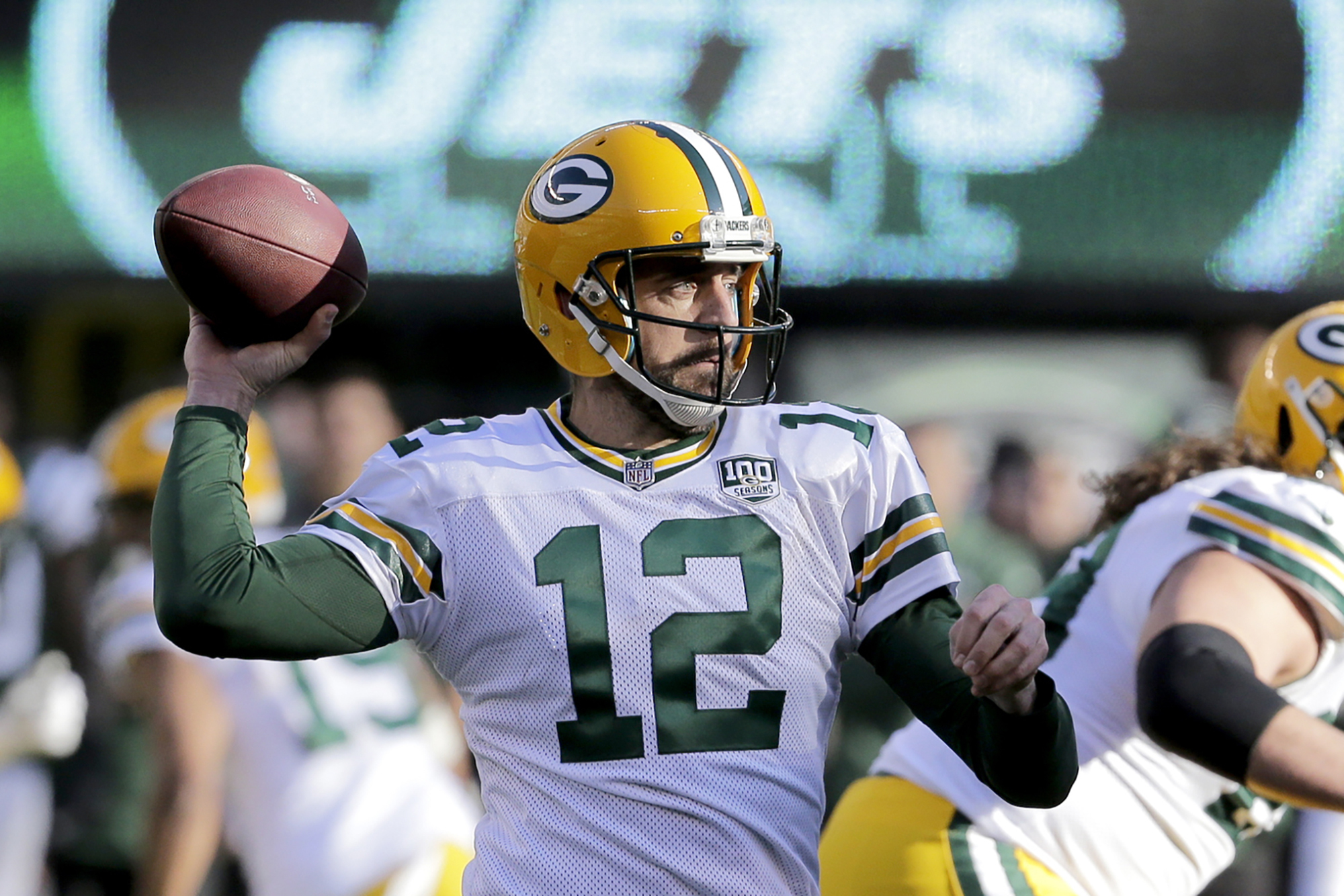 FILE - Green Bay Packers quarterback Aaron Rodgers throws a pass against the New York Jets during the first half of an NFL football game Dec. 23, 2018, in East Rutherford, N.J. Rodgers is leaving behind his brilliant legacy in Green Bay and heading to the bright lights — and massive expectations — of the Big Apple. The New York Jets agreed on a deal Monday, April 24, 2023, to acquire the four-time NFL MVP from the Packers, according to a person with knowledge of the trade. The person spoke to The Associated Press on the condition of anonymity because the teams have not officially announced the deal. (AP Photo/Seth Wenig, File)