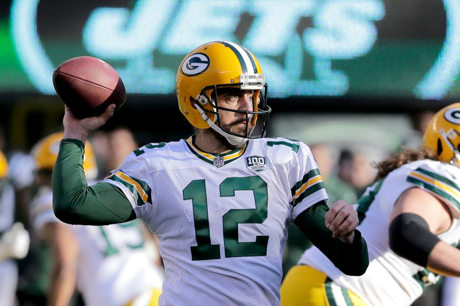 FILE - Green Bay Packers quarterback Aaron Rodgers throws a pass against the New York Jets during the first half of an NFL football game Dec. 23, 2018, in East Rutherford, N.J. Rodgers is leaving behind his brilliant legacy in Green Bay and heading to the bright lights — and massive expectations — of the Big Apple. The New York Jets agreed on a deal Monday, April 24, 2023, to acquire the four-time NFL MVP from the Packers, according to a person with knowledge of the trade. The person spoke to The Associated Press on the condition of anonymity because the teams have not officially announced the deal. (AP Photo/Seth Wenig, File)