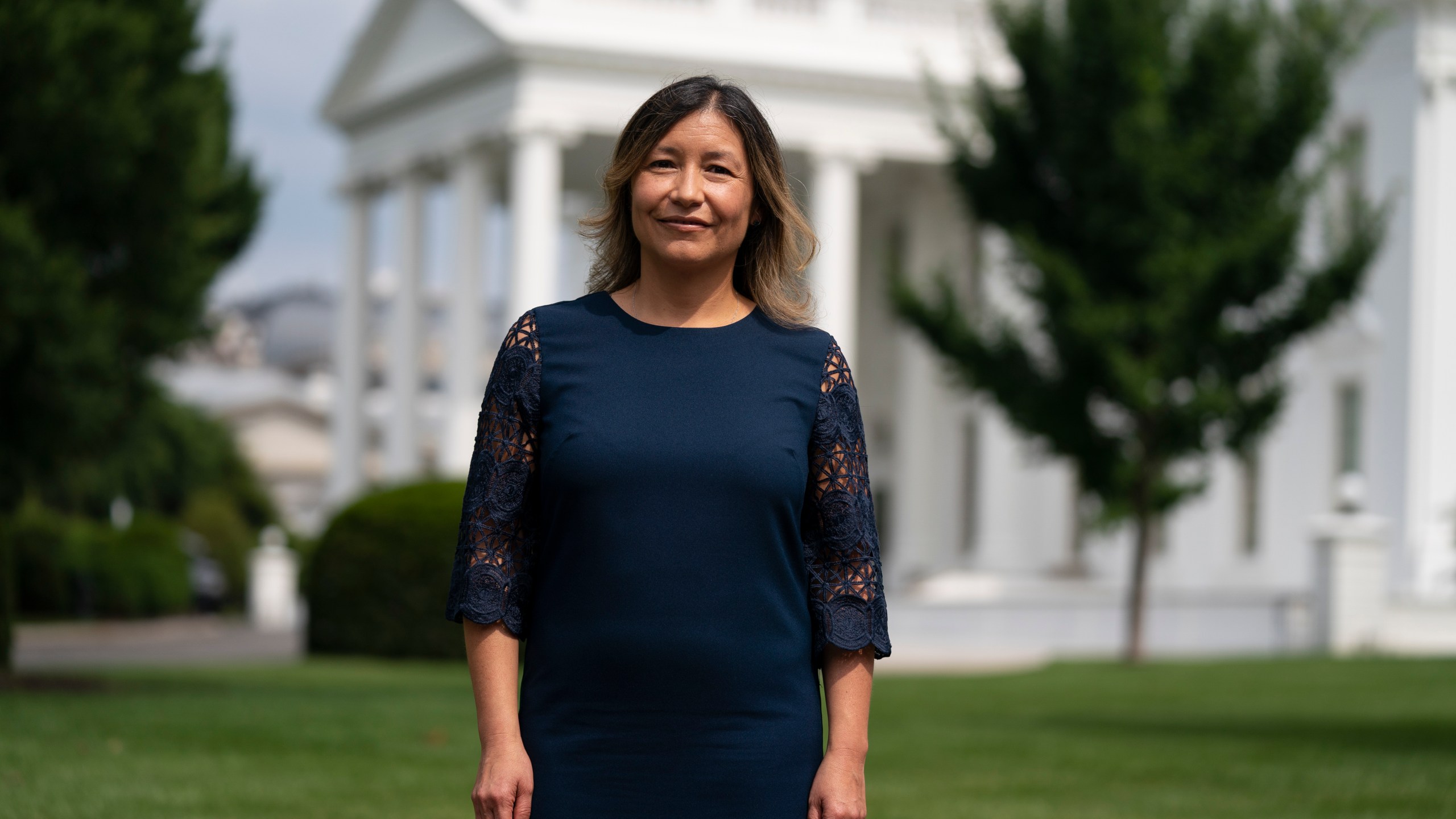 FILE - White House Intergovernmental Affairs director Julie Chavez Rodriguez stands outside the White House, Wednesday, June 9, 2021, in Washington. The granddaughter of Cesar Chavez and a bronze bust of the late Latino labor activist have had prominent places in President Joe Biden’s White House. And now Julie Chavez Rodriguez is moving on from his White House staff to take another high-profile position at the helm of Biden's reelection campaign. (AP Photo/Evan Vucci, File)