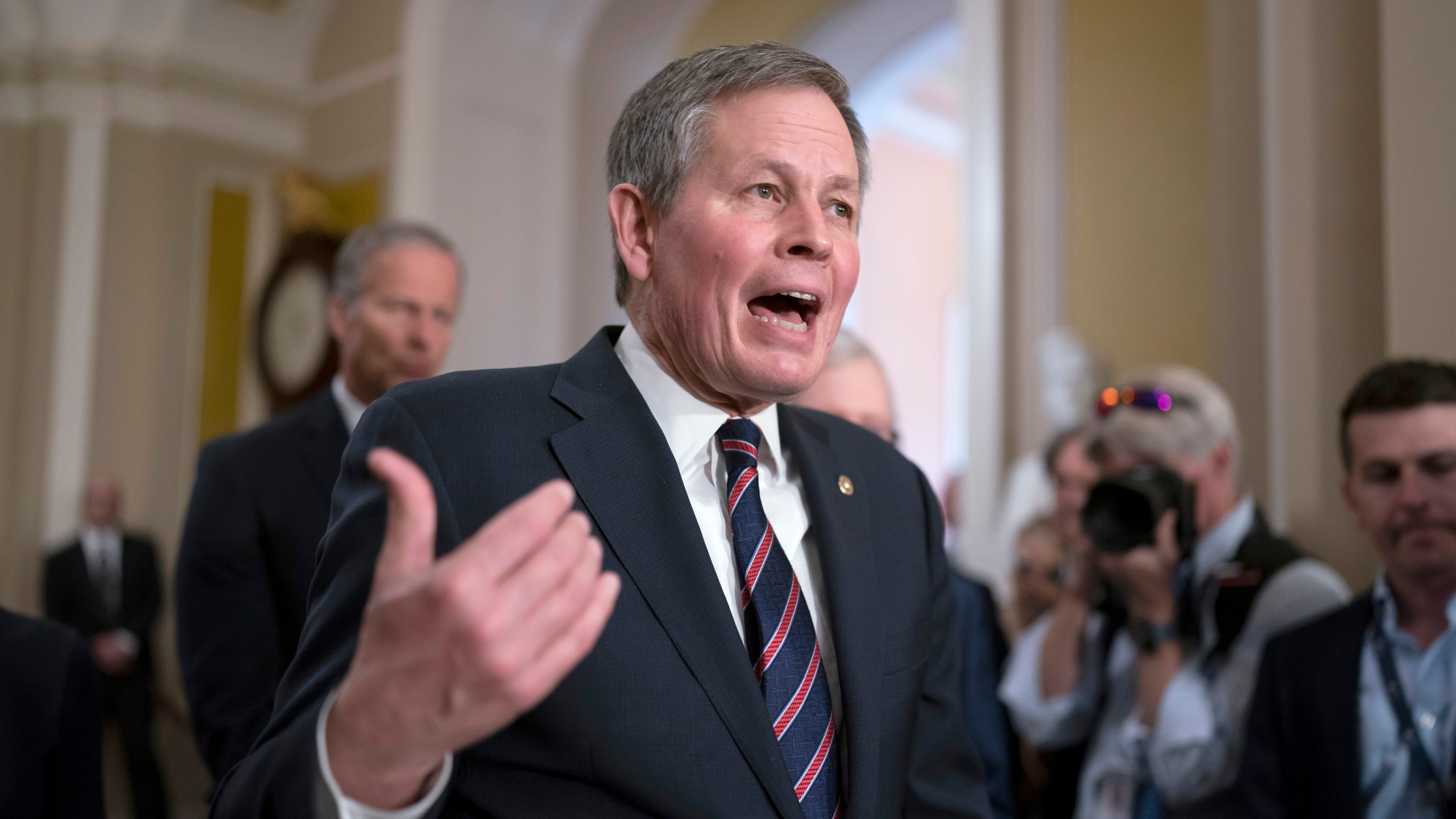 Sen. Steve Daines, R-Mont., speaks to reporters after the Republican leadership held a closed-door strategy session, at the Capitol in Washington, Tuesday, April 18, 2023. (AP Photo/J. Scott Applewhite)