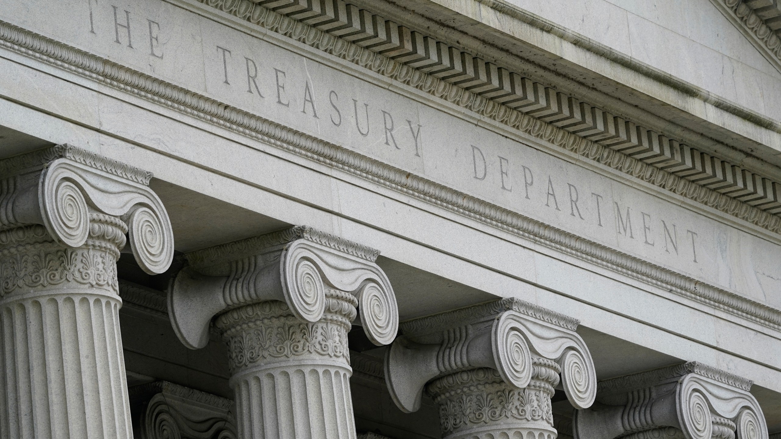 FILE - The Treasury Building is viewed in Washington, May 4, 2021. Treasury is facing increasing pressure to use its sanctions powers against the people, financial institutions and companies that have participated in the explosion of fentanyl use and distribution in the U.S. Treasury has imposed some sanctions on fentanyl producers and traffickers in recent years (AP Photo/Patrick Semansky, File)