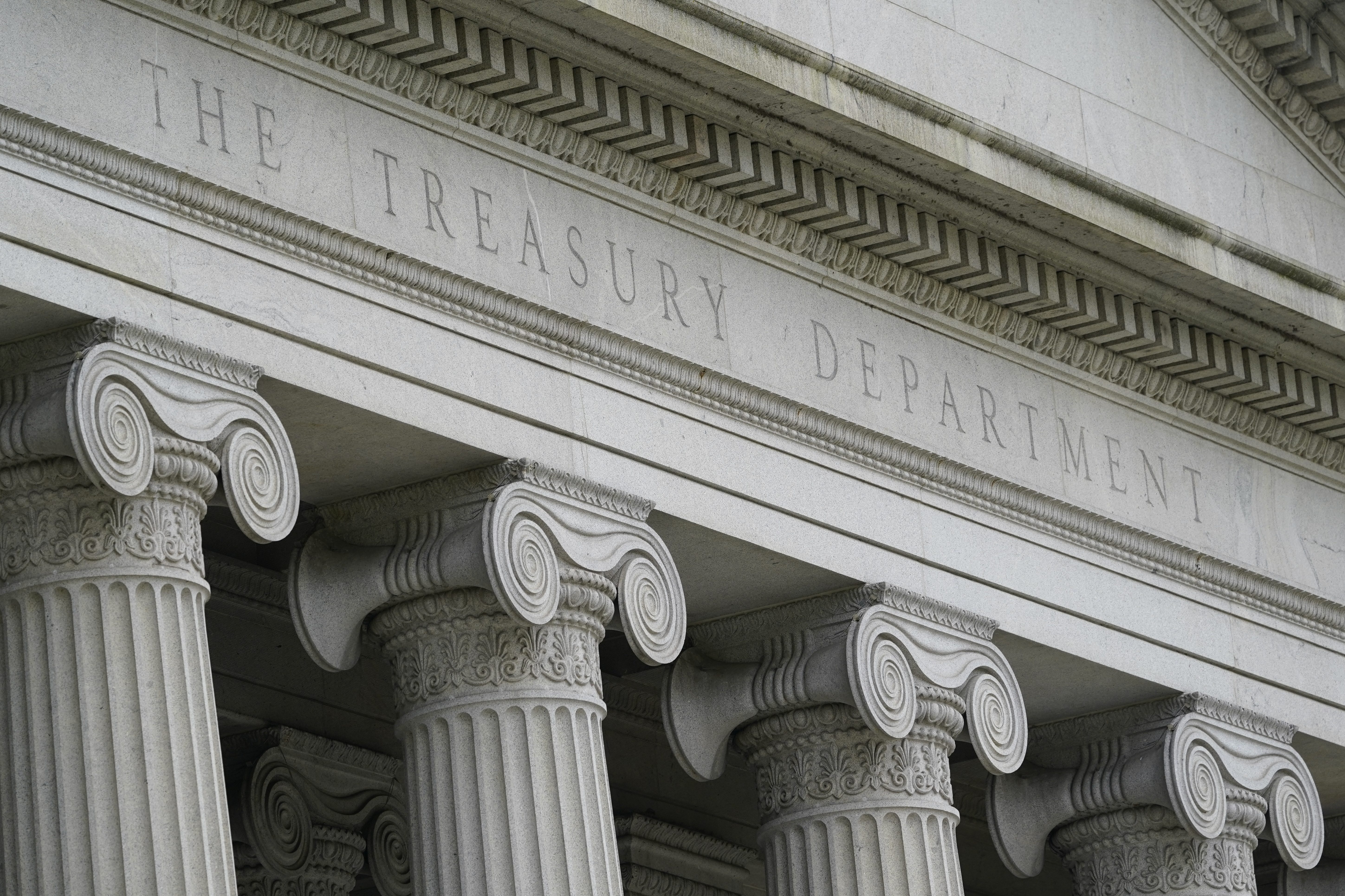 FILE - The Treasury Building is viewed in Washington, May 4, 2021. Treasury is facing increasing pressure to use its sanctions powers against the people, financial institutions and companies that have participated in the explosion of fentanyl use and distribution in the U.S. Treasury has imposed some sanctions on fentanyl producers and traffickers in recent years (AP Photo/Patrick Semansky, File)