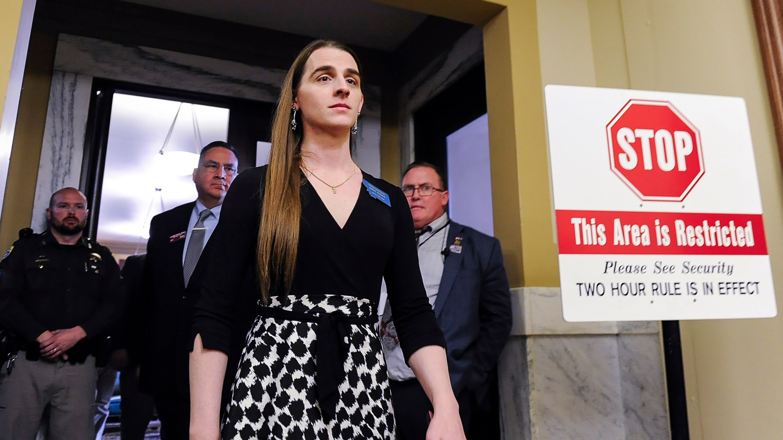 Rep. Zooey Zephyr, D-Missoula, walks out of the Montana House of Representatives after lawmakers voted to ban her from the chamber on Wednesday, April 26, 2023, in the State Capitol in Helena, Montana. Zephyr was barred from participating on the House floor as Republican leaders voted Wednesday to silence her for the rest of 2023 session after she protested GOP leaders’ decision earlier in the week to silence her. (Thom Bridge/Independent Record via AP)