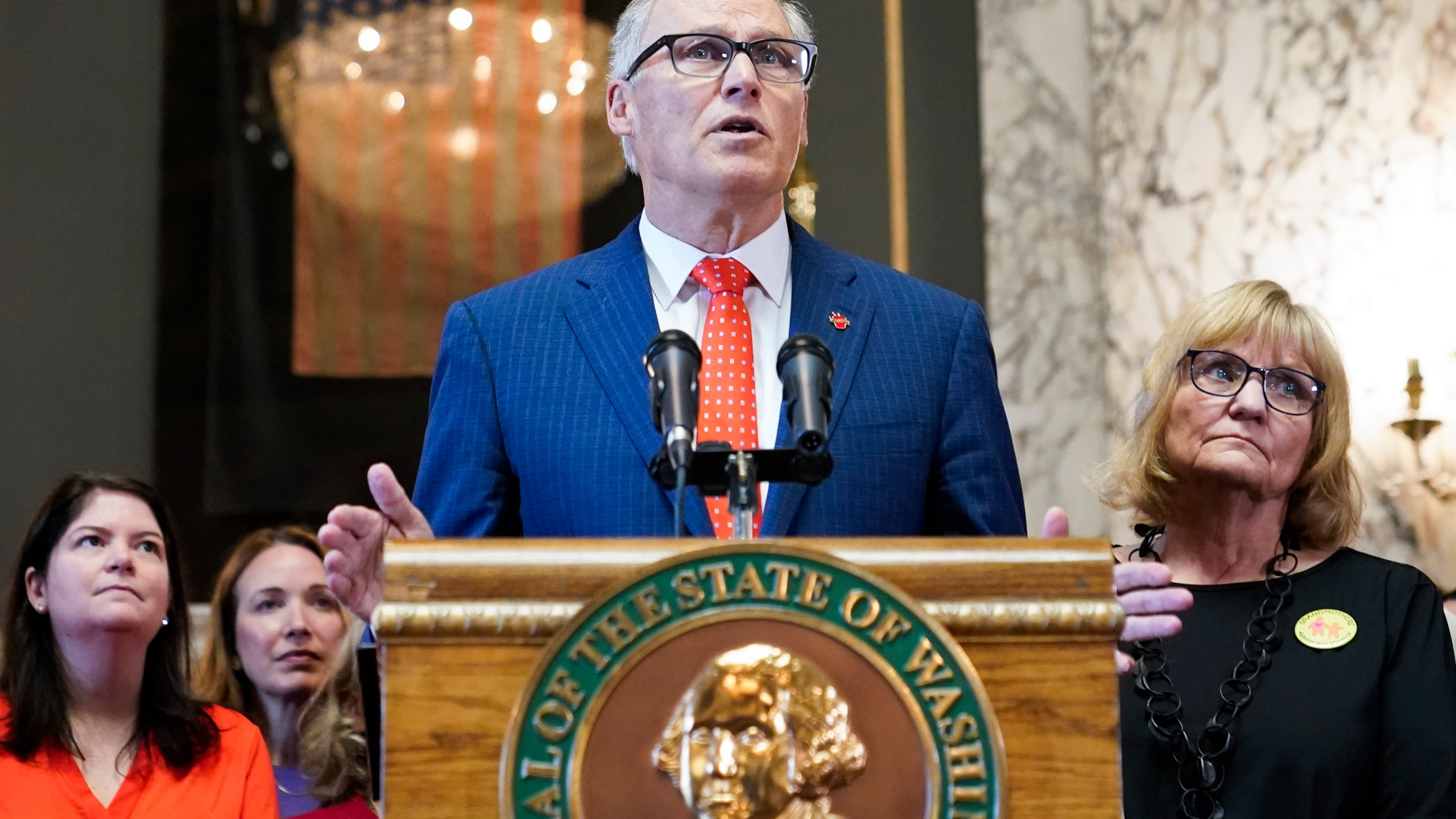 FILE - Washington Gov. Jay Inslee speaks before signing multiple bills meant to prevent gun violence, Tuesday, April 25, 2023, at the Capitol in Olympia, Wash. On Monday, May 1, 2023, Inslee announced he does not plan to seek a fourth term. He was most recently re-elected in 2020, making him only the second Washington state governor to serve three consecutive terms. (AP Photo/Lindsey Wasson, File)