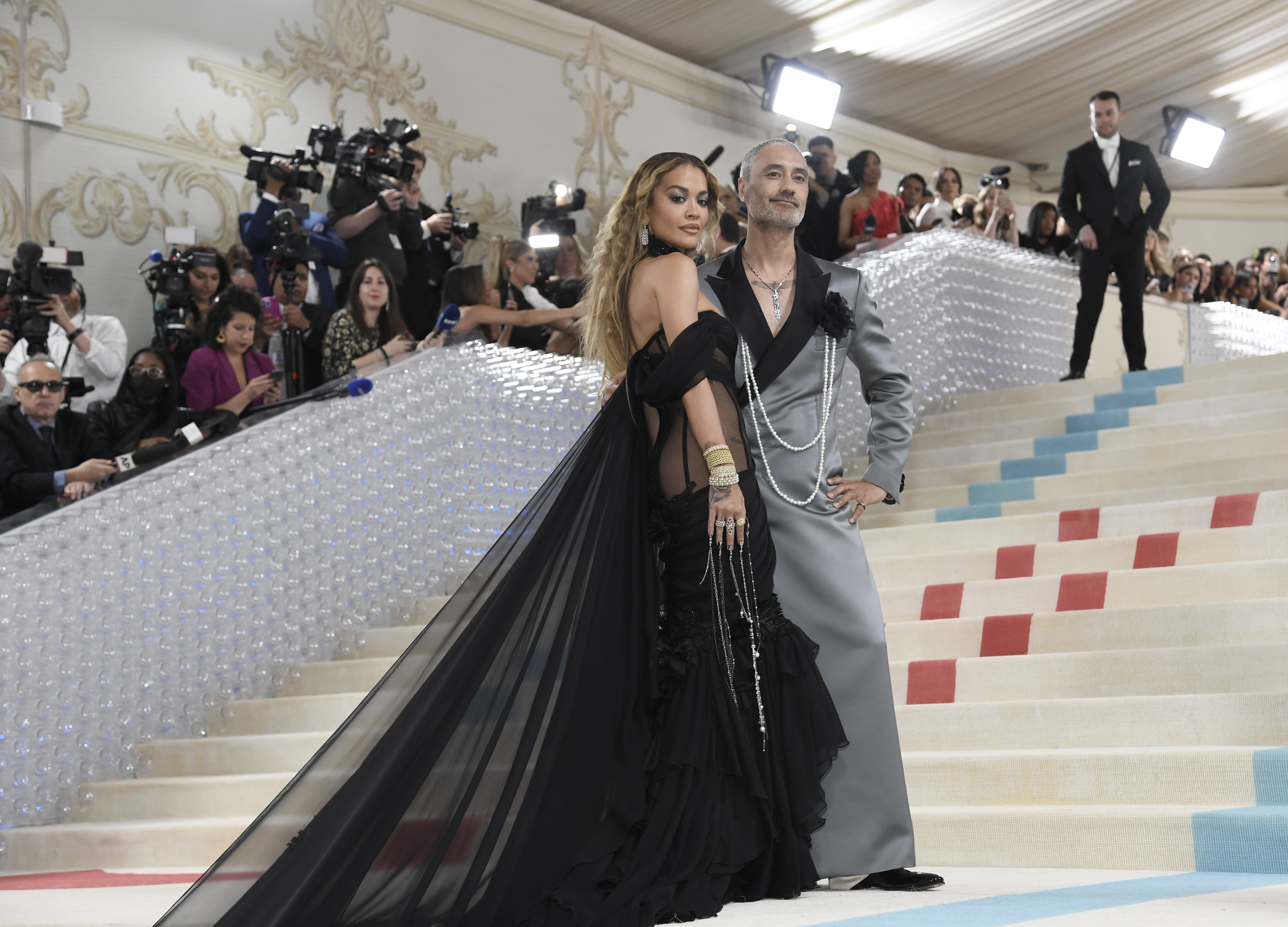 Rita Ora, left, and Taika Waititi attend The Metropolitan Museum of Art's Costume Institute benefit gala celebrating the opening of the "Karl Lagerfeld: A Line of Beauty" exhibition on Monday, May 1, 2023, in New York. (Photo by Evan Agostini/Invision/AP)