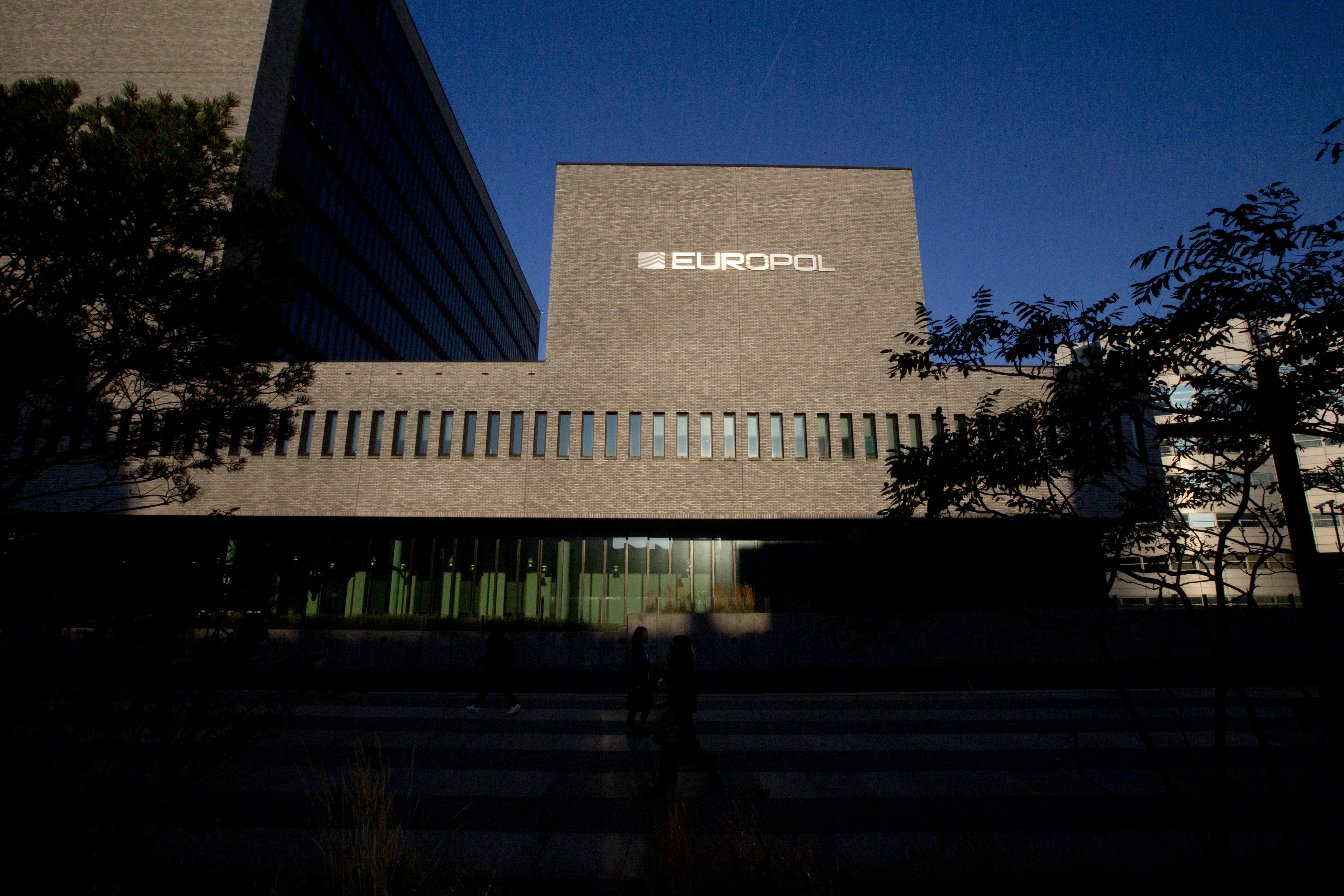 FILE- This Wednesday, Oct. 10, 2018, file photo shows the sun bouncing off the Europol headquarters in The Hague, Netherlands. LEuropean Union law enforcement agency Europol says police around the world have seized an online marketplace and arrested nearly 300 people allegedly involved in buying and selling drugs on the dark web. The operation, coordinated by Europol and targeting the “Monopoly Market,” is the latest major takedown of sales platforms for drugs and other illicit goods on the dark web. Europol said Tuesday, May 2, 2023. (AP Photo/Peter Dejong, File)