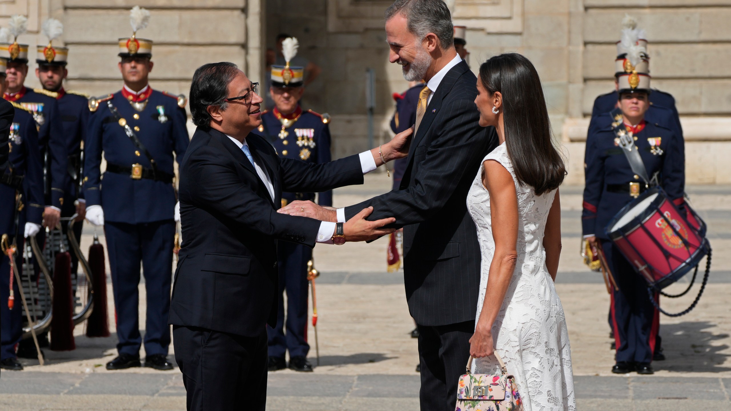 Colombia's President Gustavo Petro, left, and Spain's King Felipe, centre, greet each other alongside Spain's Queen Letizia during a welcome ceremony at the Royal Palace in Madrid, Spain, Wednesday, May 3, 2023. President Petro is on a state visit to Spain. (AP Photo/Paul White)