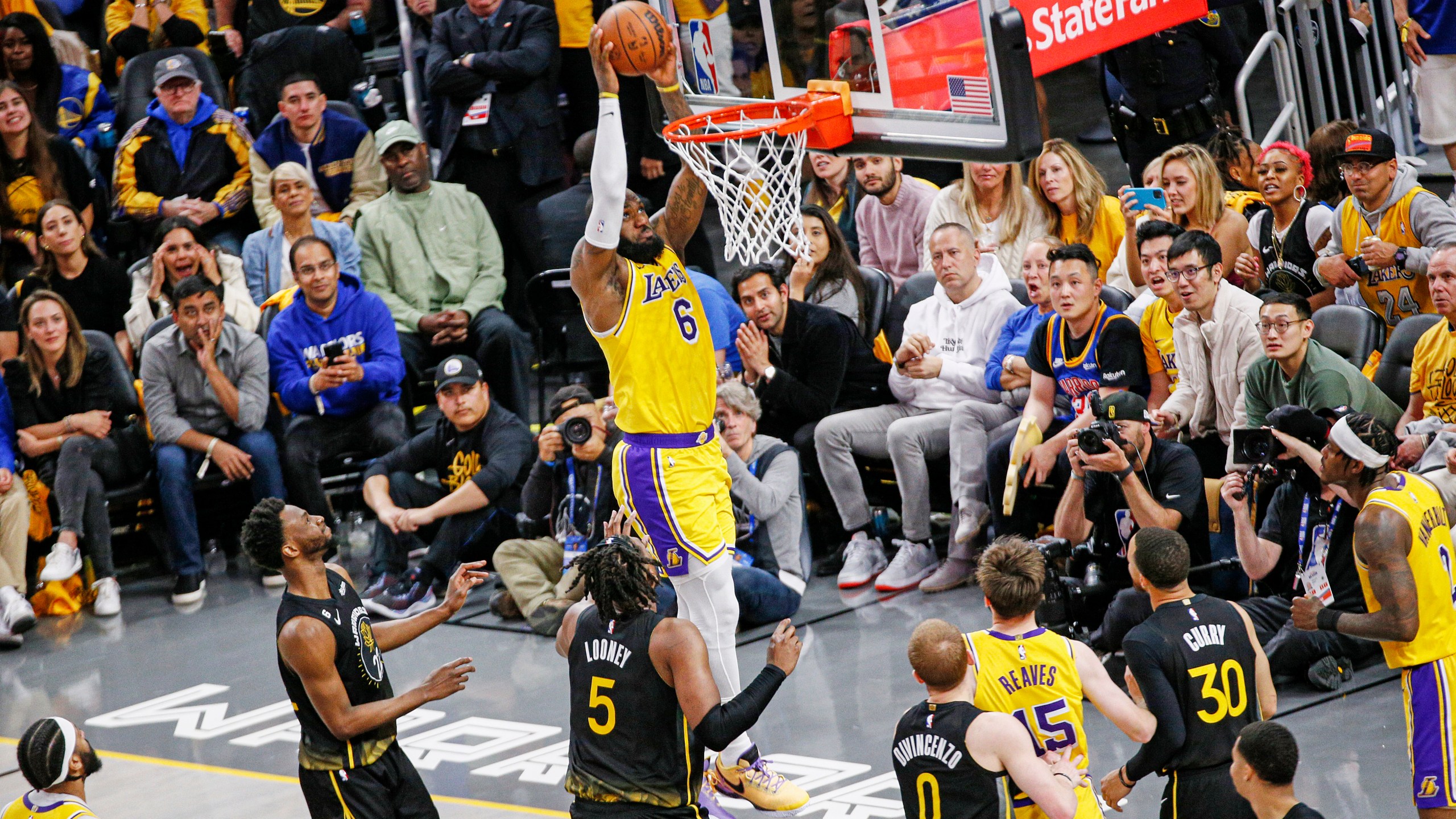 Los Angeles Lakers forward LeBron James (6) dunks against the Golden State Warriors during the fourth quarter of an NBA basketball Western Conference semifinal game, Tuesday, May 2, 2023, in San Francisco.(Santiago Mejia/San Francisco Chronicle via AP)