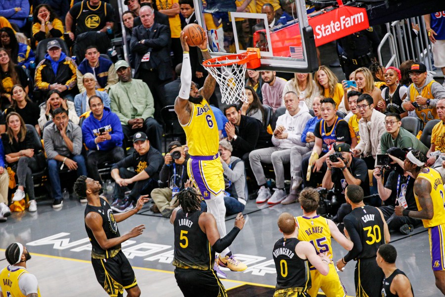 Los Angeles Lakers forward LeBron James (6) dunks against the Golden State Warriors during the fourth quarter of an NBA basketball Western Conference semifinal game, Tuesday, May 2, 2023, in San Francisco.(Santiago Mejia/San Francisco Chronicle via AP)