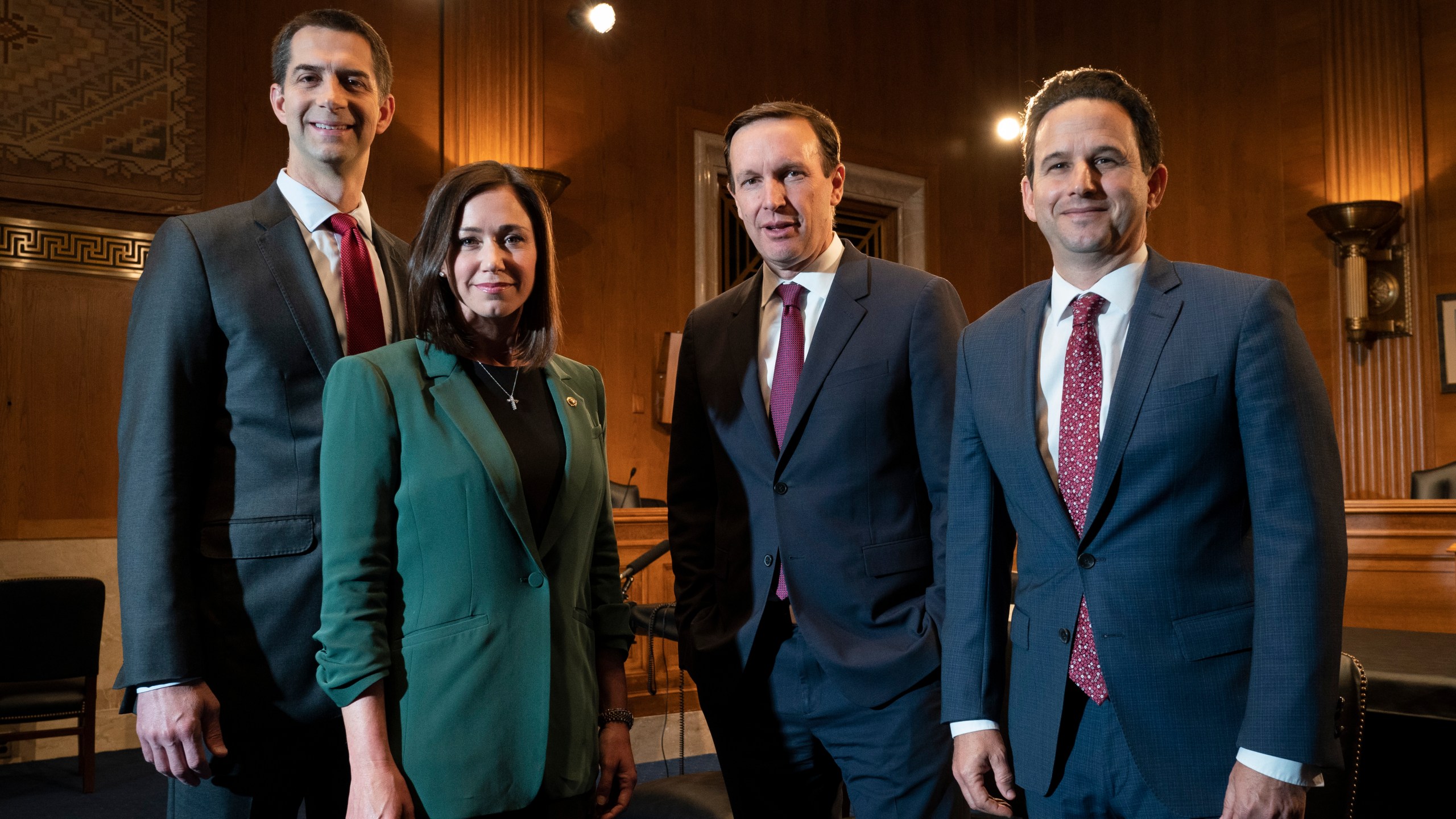 From left, Sen. Tom Cotton, R-Ark., Sen. Katie Britt, R-Ala., Sen. Christopher Murphy, D-Conn., and Sen. Brian Schatz, D-Hawaii, who have introduced legislation to protect kids on social media, pose for a portrait after being interviewed by the Associated Press, Wednesday, May 3, 2023, on Capitol Hill in Washington. (AP Photo/Jacquelyn Martin)