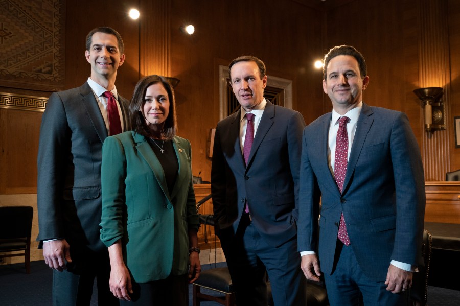 From left, Sen. Tom Cotton, R-Ark., Sen. Katie Britt, R-Ala., Sen. Christopher Murphy, D-Conn., and Sen. Brian Schatz, D-Hawaii, who have introduced legislation to protect kids on social media, pose for a portrait after being interviewed by the Associated Press, Wednesday, May 3, 2023, on Capitol Hill in Washington. (AP Photo/Jacquelyn Martin)