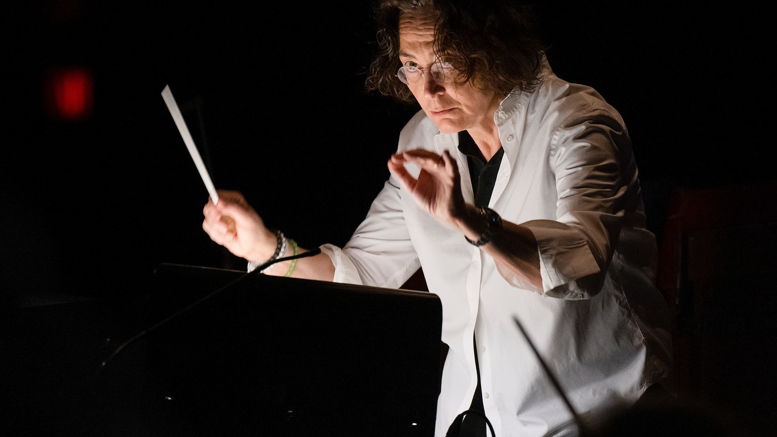 Nathalie Stutzmann conducts a recent orchestra rehearsal, Friday, April 28, 2023, in New York. Stutzmann gave up a quarter-century career as a contralto to become a conductor and makes her Metropolitan Opera debut in a new production of Mozart's "Don Giovanni" on Friday night. (Courtesy of the Metropolitan Opera via AP)