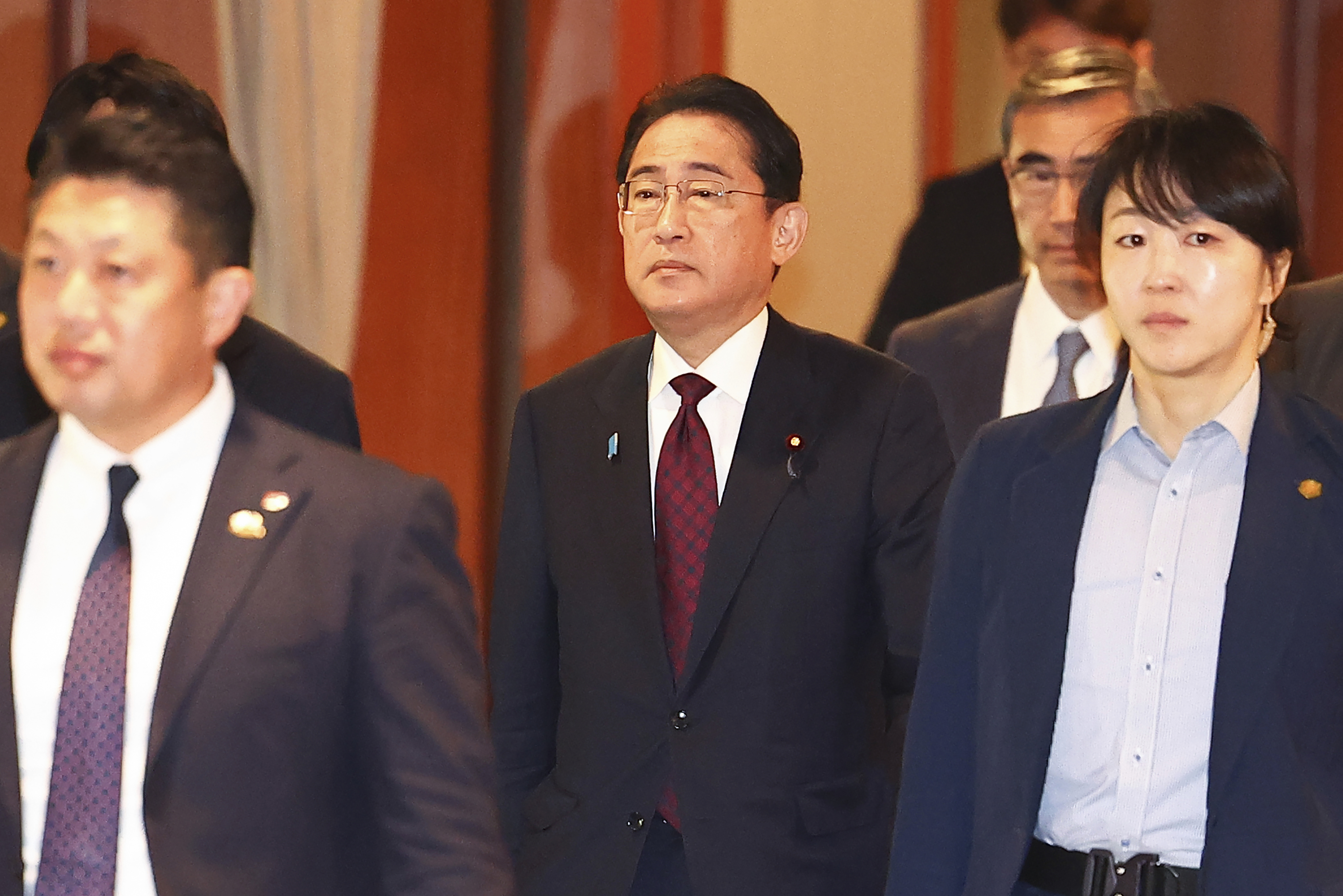 Japanese Prime Minister Fumio Kishida, center, leaves after meeting with business leaders at a hotel in Seoul, South Korea, Monday, May 8, 2023. (Seo Dae-yeon/Yonhap via AP)