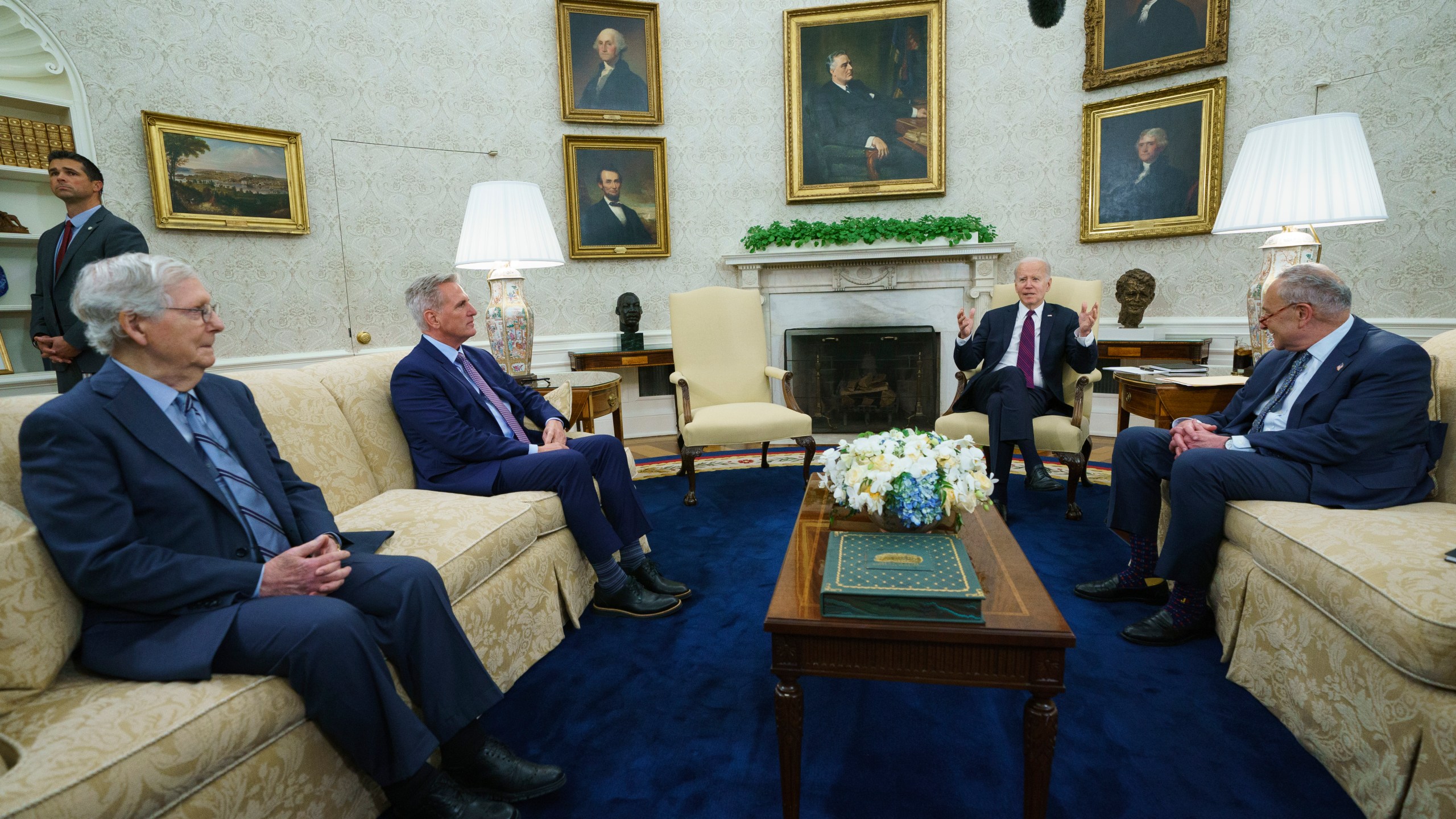 Senate Minority Leader Mitch McConnell of Ky., Speaker of the House Kevin McCarthy of Calif., and Senate Majority Leader Sen. Chuck Schumer of N.Y., listen as President Joe Biden speaks before a meeting to discuss the debt limit in the Oval Office of the White House, Tuesday, May 9, 2023, in Washington. (AP Photo/Evan Vucci)