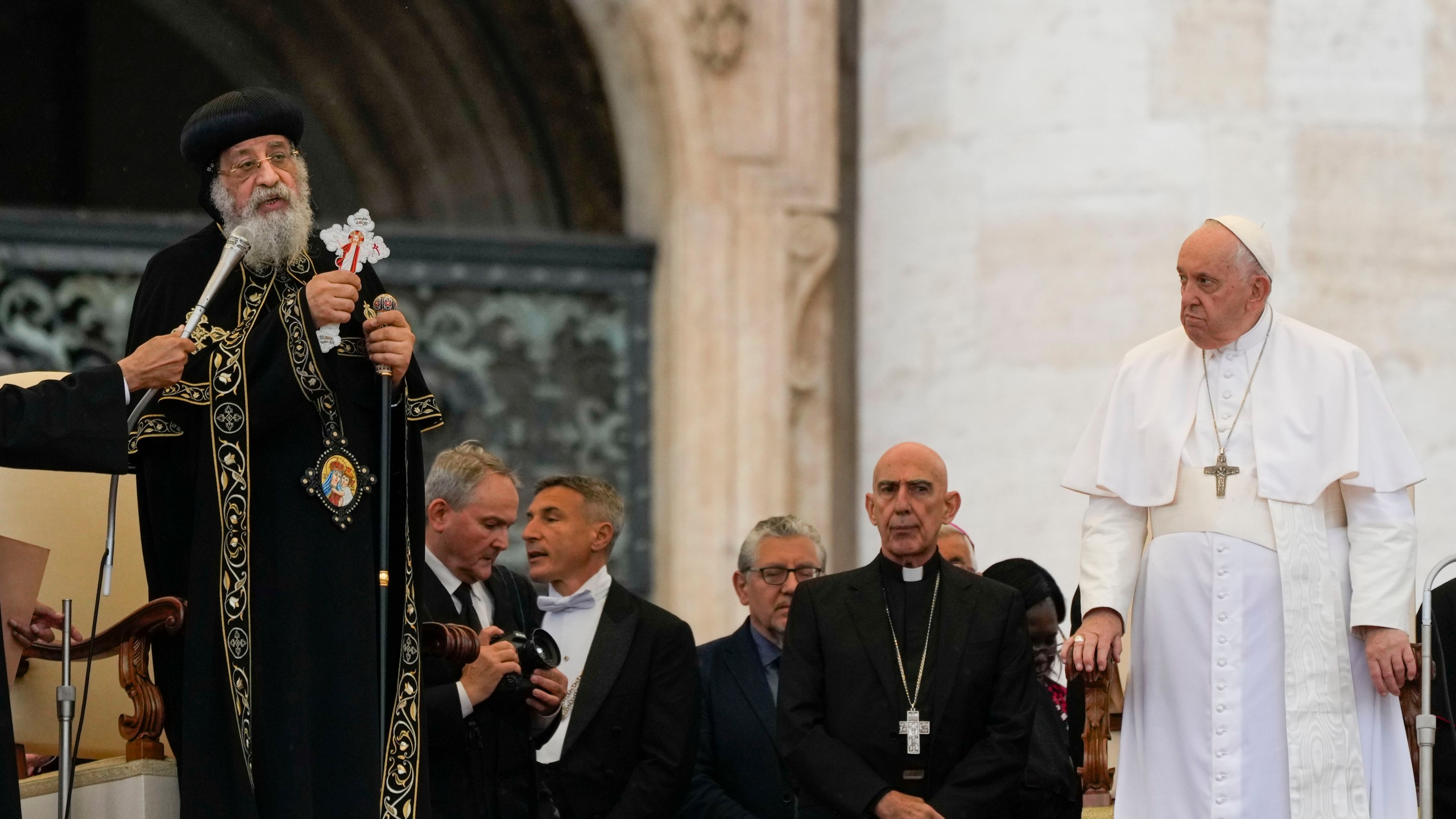 Pope Francis, right, starts his weekly general audience in St. Peter's Square at The Vatican, with the leader of the Coptic Orthodox Church of Alexandria, Tawadros II,Wednesday, May 10, 2023. (AP Photo/Alessandra Tarantino)