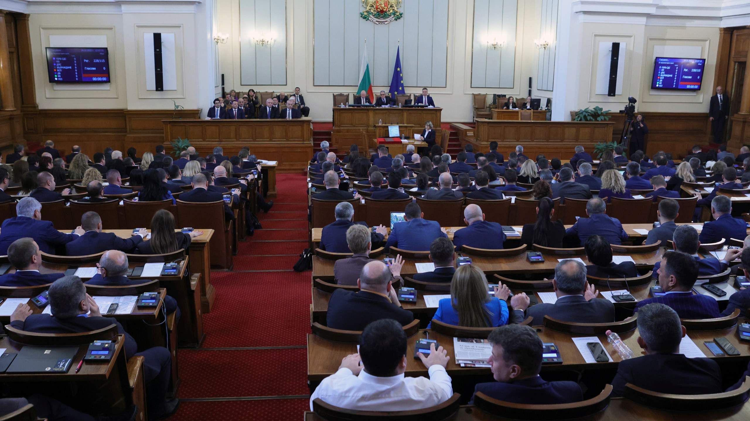 FILE - Interior view of the Bulgarian Parliament during a meeting, in Sofia, Bulgaria, Wednesday, Dec. 14, 2022. A European Union commissioner from Bulgaria has been nominated for the post of prime minister as the Balkan country struggles to end a two-year period of political instability and economic hardship. Maria Gabriel was tipped on Wednesday by the center-right GERB party to receive a mandate. (AP Photo/Valentina Petrova, File)