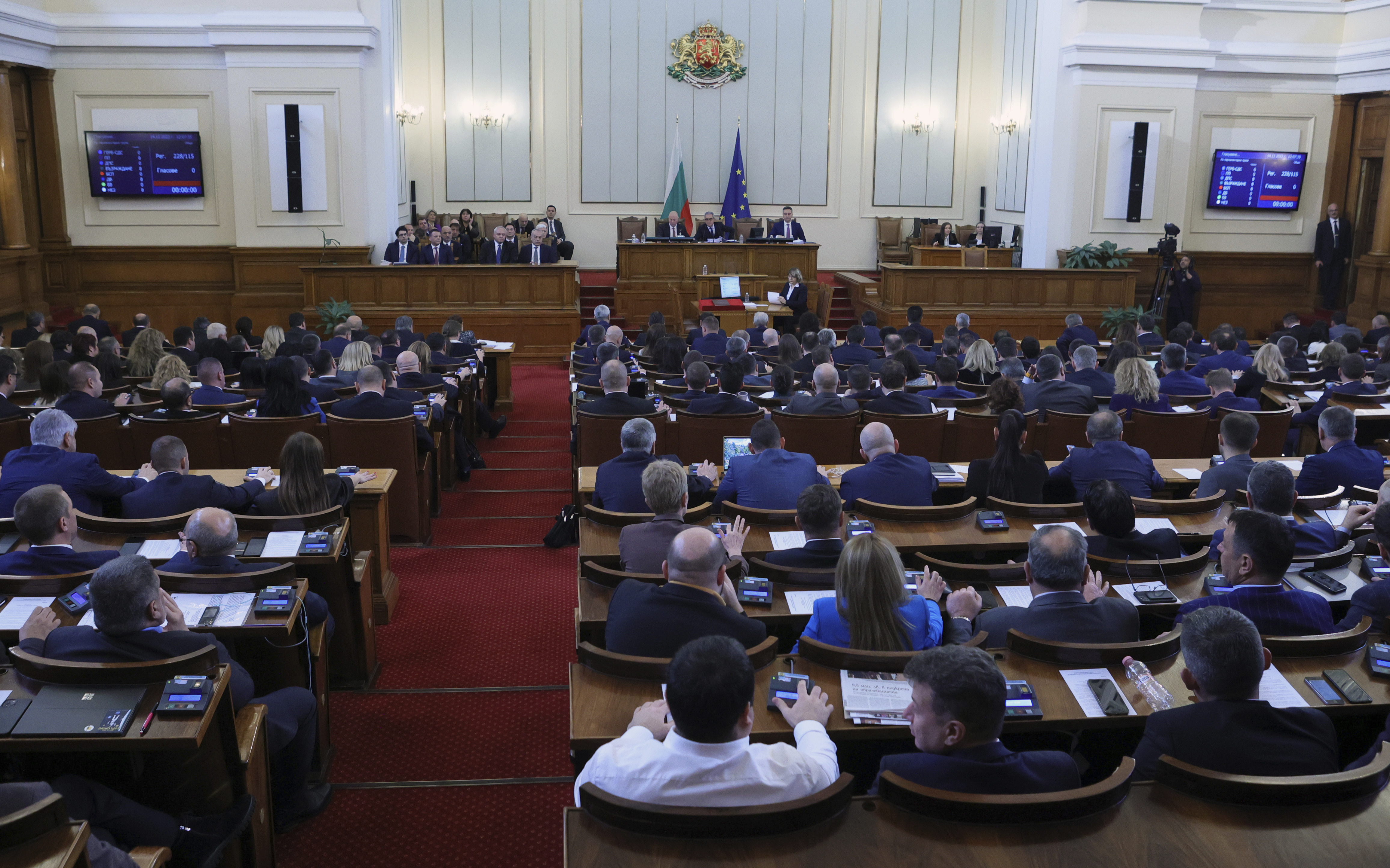 FILE - Interior view of the Bulgarian Parliament during a meeting, in Sofia, Bulgaria, Wednesday, Dec. 14, 2022. A European Union commissioner from Bulgaria has been nominated for the post of prime minister as the Balkan country struggles to end a two-year period of political instability and economic hardship. Maria Gabriel was tipped on Wednesday by the center-right GERB party to receive a mandate. (AP Photo/Valentina Petrova, File)