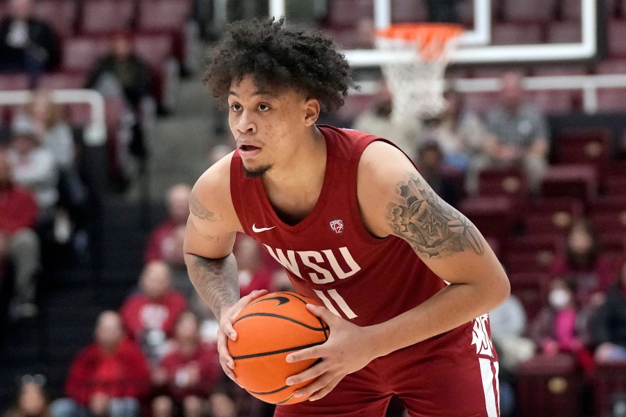 FILE - Washington State forward DJ Rodman (11) during an NCAA college basketball game against Stanford in Stanford, Calif., Thursday, Feb. 23, 2023. Southern California have already landed Bronny James, son of Los Angeles Lakers superstar LeBron James. Now, D.J. Rodman, the son of NBA rebounding great Dennis Rodman, has announced on social media that he's transferring to USC. Rodman will take advantage of an NCAA rule allowing an extra year of eligibility because of the COVID-19 pandemic to play for the Trojans close to his hometown of Newport Beach, Calif. (AP Photo/Jeff Chiu, File)