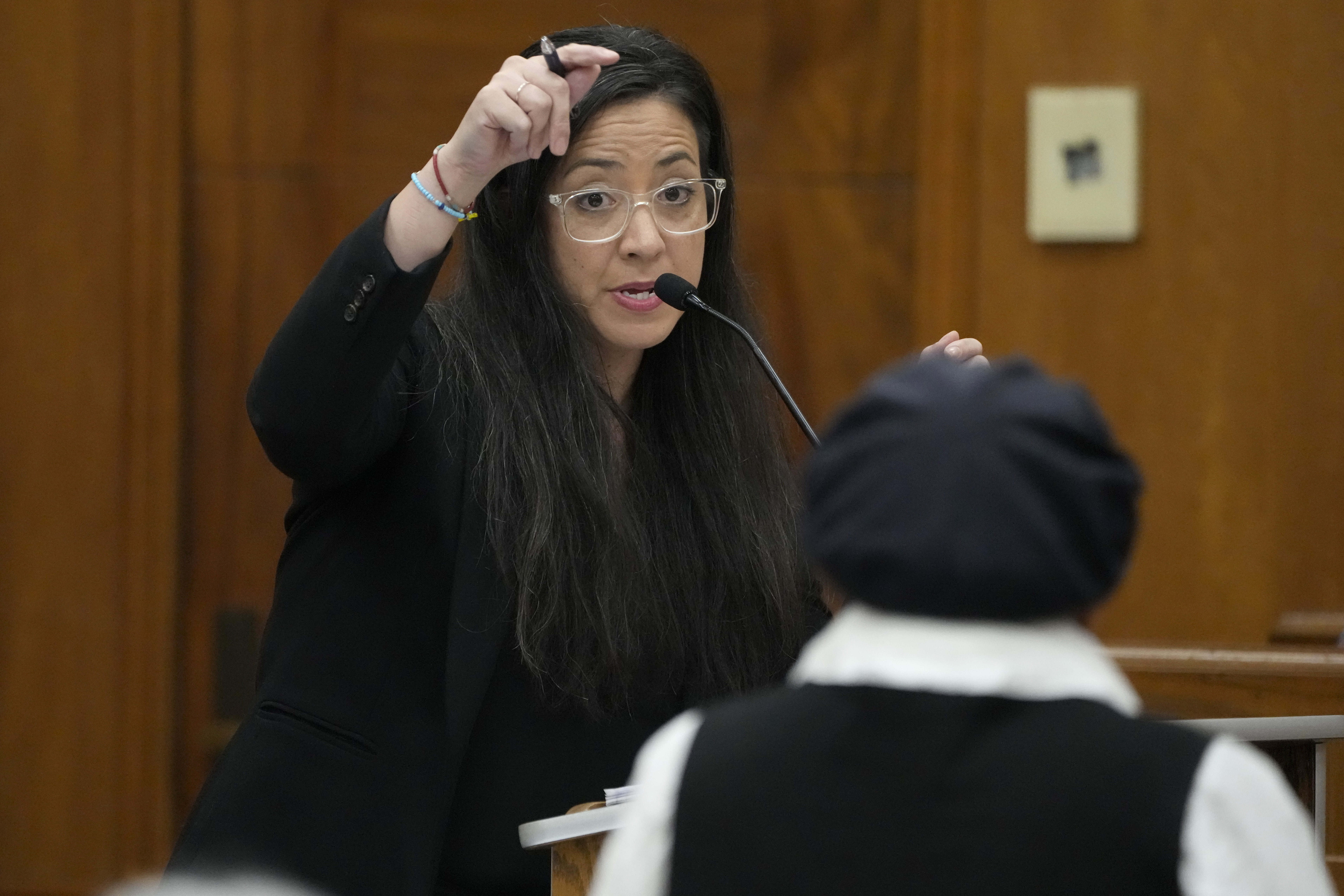 Attorney Paloma Wu, with the Mississippi Center For Justice, questions plaintiff Ann Saunders, right, during a hearing, Wednesday, May 10, 2023, in Hinds County Chancery Court in Jackson, Miss., where a judge heard arguments about a Mississippi law that would create a court system with judges who would be appointed rather than elected. (AP Photo/Rogelio V. Solis)