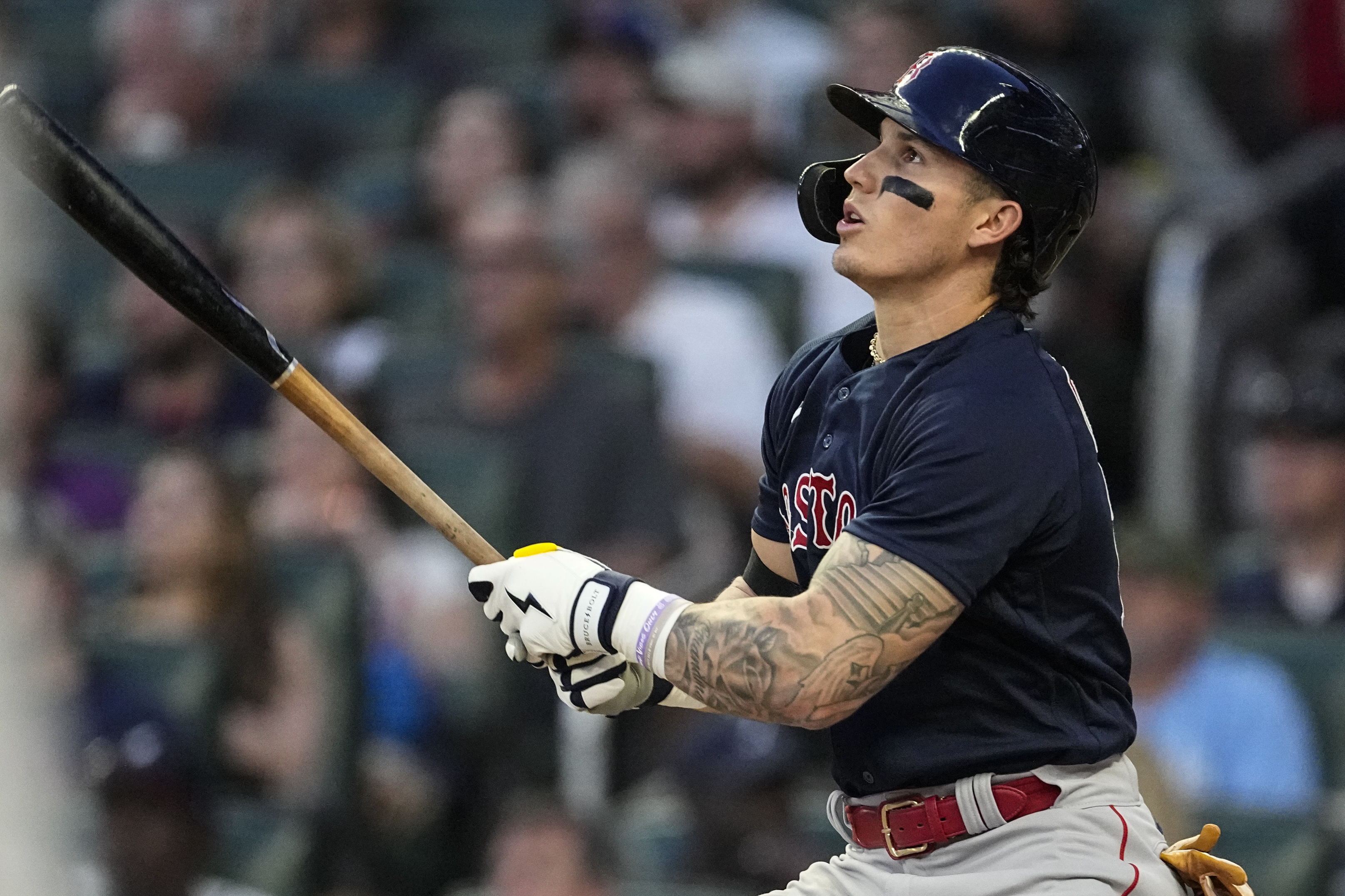 Boston Red Sox's Jarren Duran watches his RBI single against the Atlanta Braves during the fourth inning of a baseball game Wednesday, May 10, 2023, in Atlanta. (AP Photo/John Bazemore)