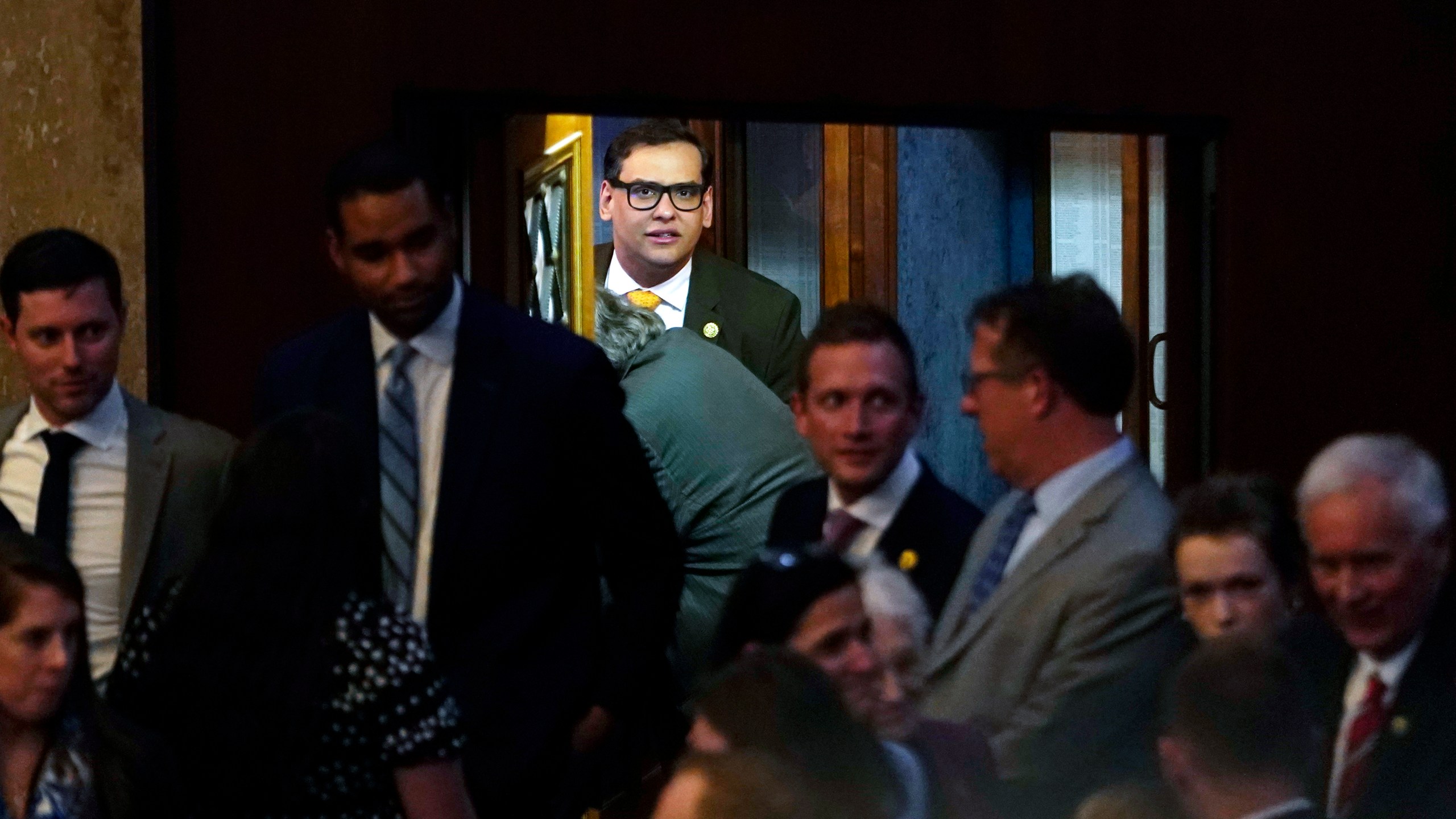 Rep. George Santos, R-N.Y., arrives at the House Chamber, Thursday, May 11, 2023, at the Capitol in Washington, as House Republicans are on track to pass a sweeping bill to build more U.S.-Mexico border wall and impose new restrictions on asylum seekers. (AP Photo/Jacquelyn Martin)