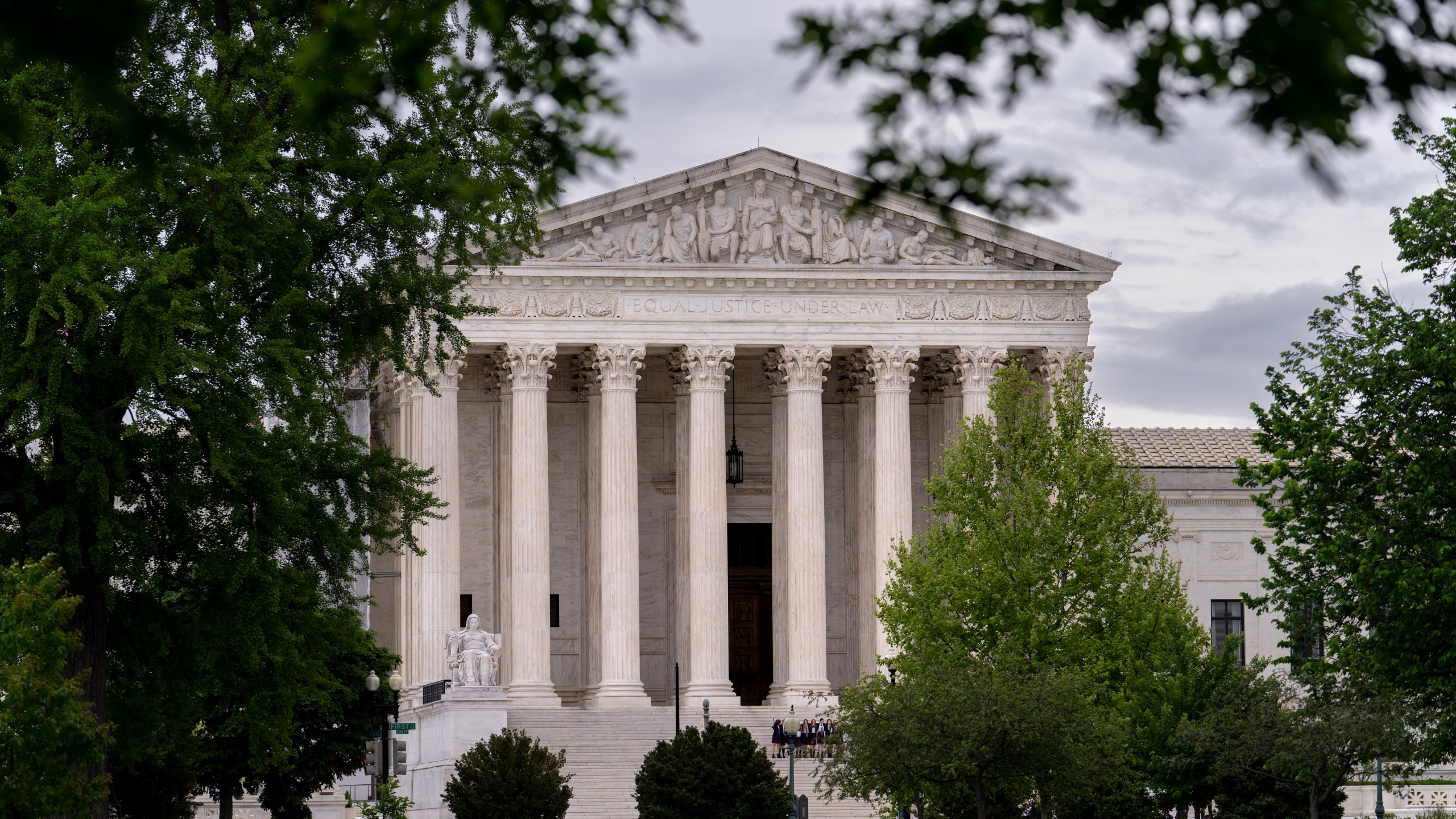 FILE - The U.S. Supreme Court is seen on Capitol Hill in Washington, May 2, 2023. The Supreme Court has rejected a challenge to a California animal cruelty law that affects the pork industry, ruling that the case was properly dismissed by lower courts. Pork producers had said that the law could force industry-wide changes and raise the cost of bacon and other pork products nationwide. (AP Photo/J. Scott Applewhite, File Photo)