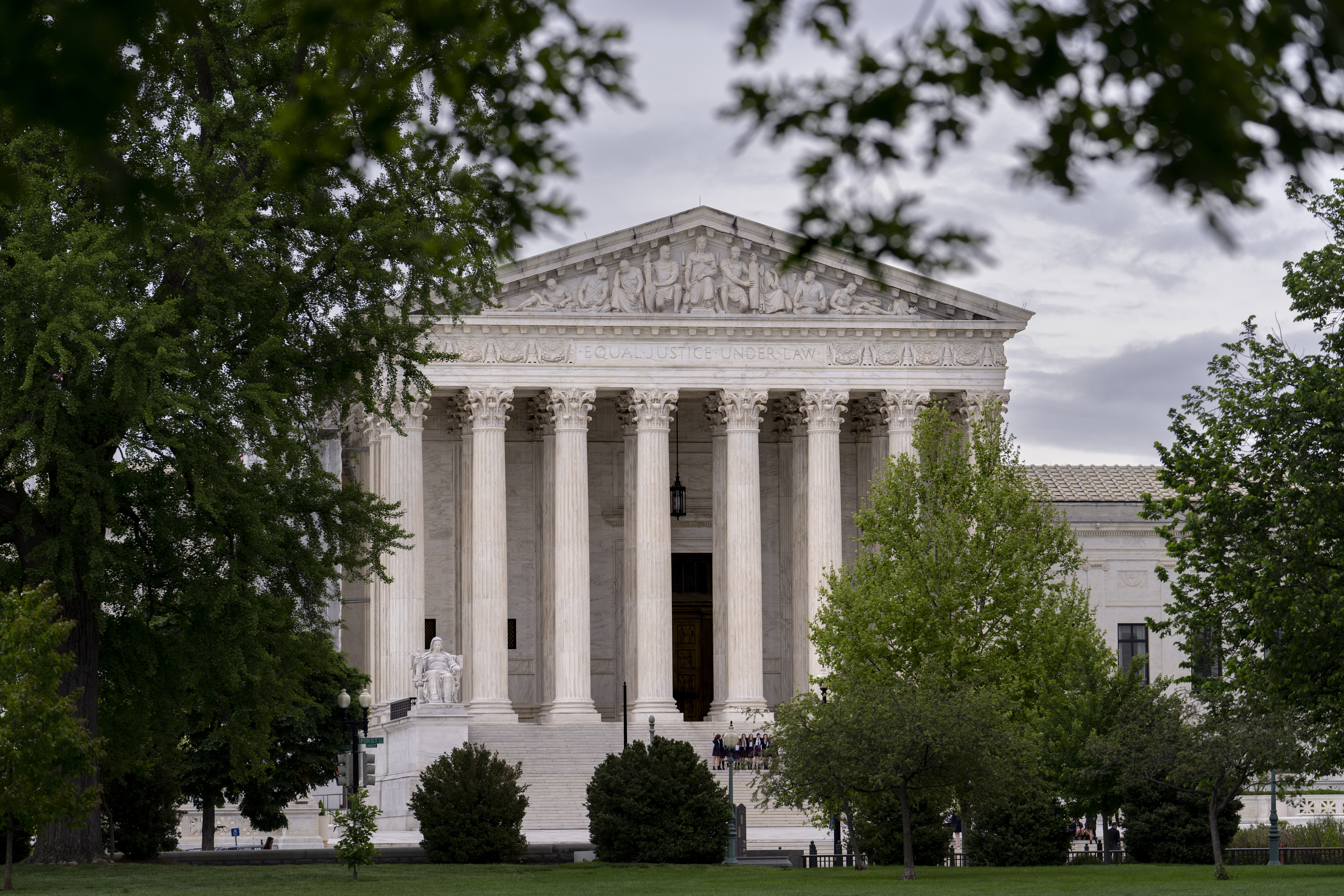 FILE - The U.S. Supreme Court is seen on Capitol Hill in Washington, May 2, 2023. The Supreme Court has rejected a challenge to a California animal cruelty law that affects the pork industry, ruling that the case was properly dismissed by lower courts. Pork producers had said that the law could force industry-wide changes and raise the cost of bacon and other pork products nationwide. (AP Photo/J. Scott Applewhite, File Photo)