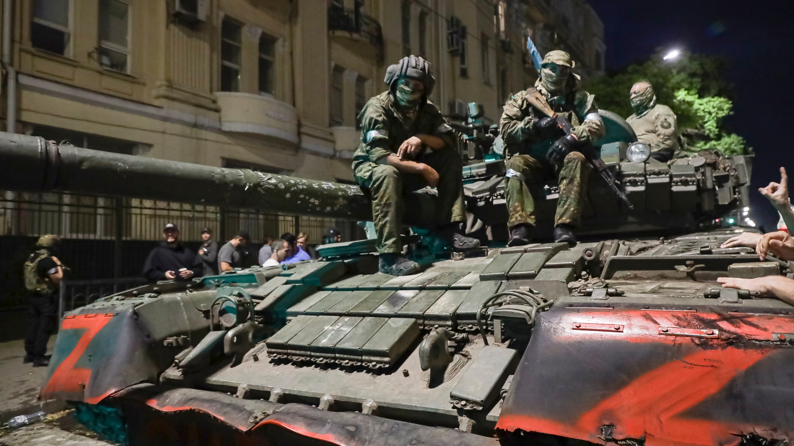 FILE - Members of the Wagner Group military company sit atop of a tank on a street in Rostov-on-Don, Russia, Saturday, June 24, 2023, prior to leaving an area at the headquarters of the Southern Military District. The U.K. says it will declare Russia’s Wagner mercenary group a banned terrorist organization. British officials say the group remains a threat to global security even after the death of leader Yevgeny Prigozhin. . (AP Photo, File)